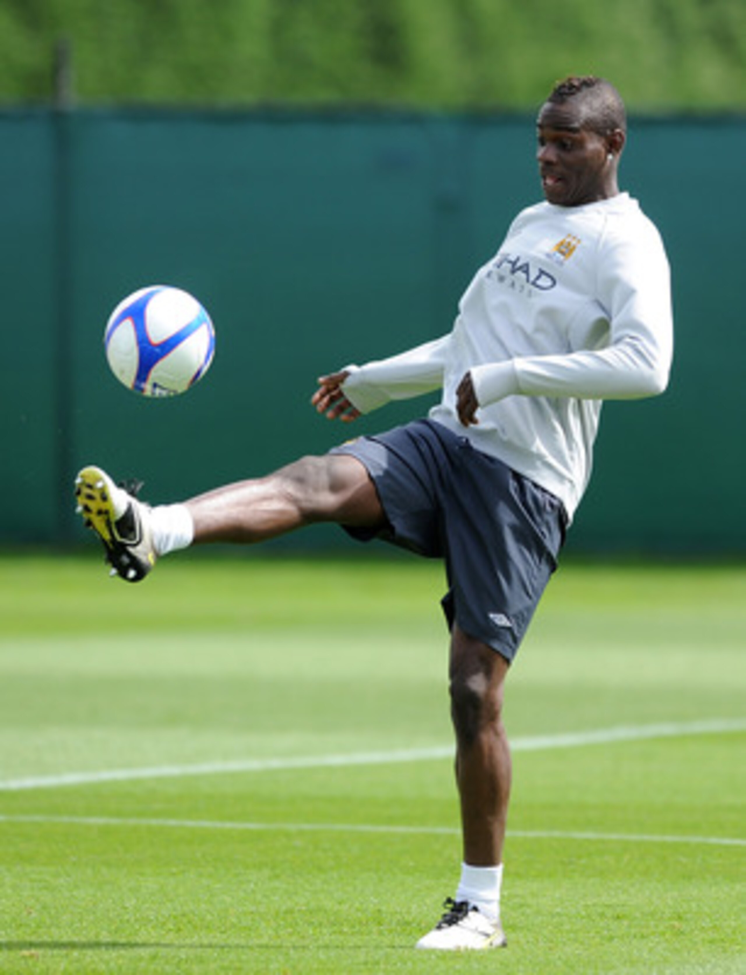 MANCHESTER, ENGLAND - MAY 12:  Mario Balotelli of Manchester City in action during a training session at Carrington Training Ground on May 12, 2011 in Manchester, England.  (Photo by Chris Brunskill/Getty Images)