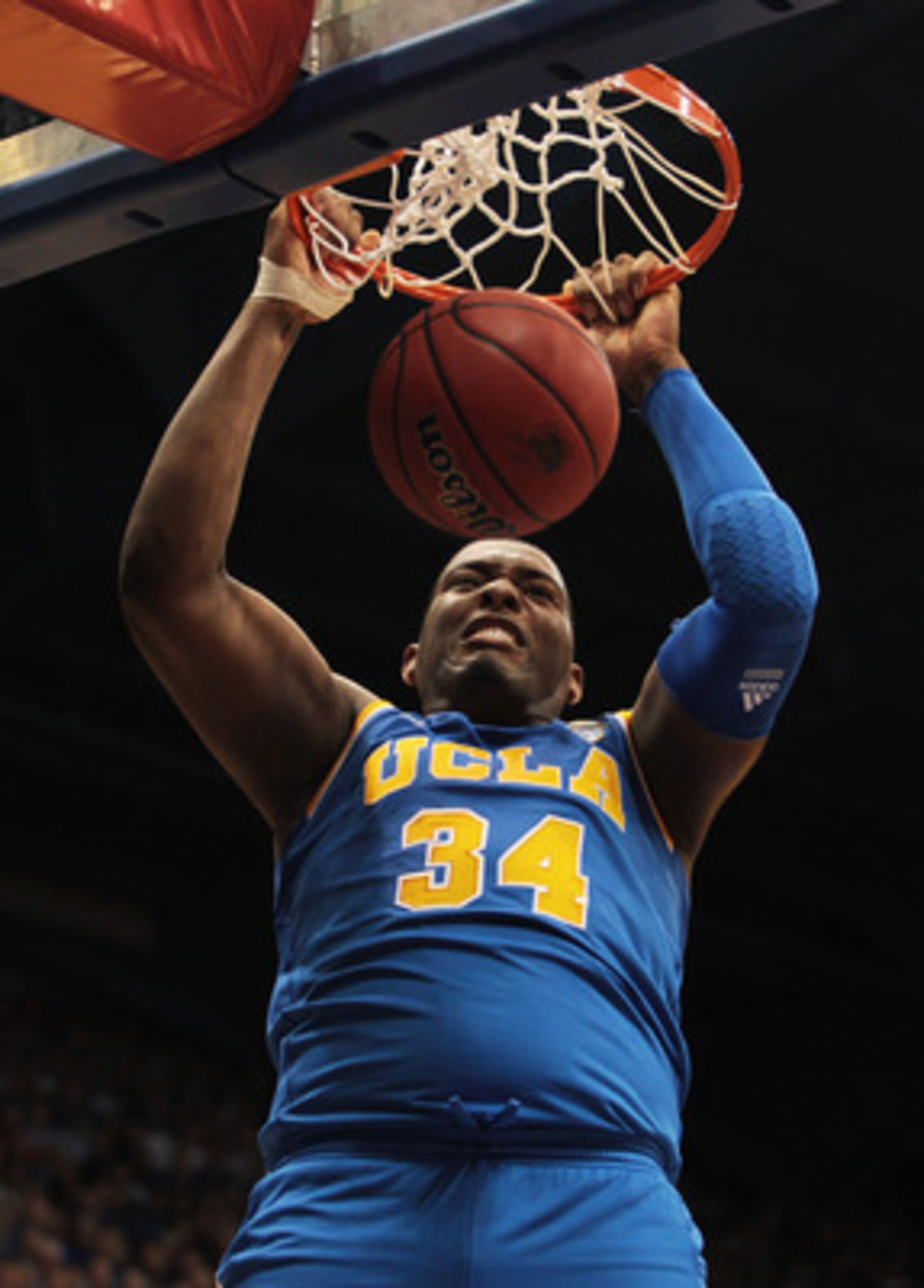 LAWRENCE, KS - DECEMBER 02:  Joshua Smith #34 of the UCLA Bruins dunks during the game against the Kansas Jayhawks on December 2, 2010 at Allen Fieldhouse in Lawrence, Kansas.  (Photo by Jamie Squire/Getty Images)