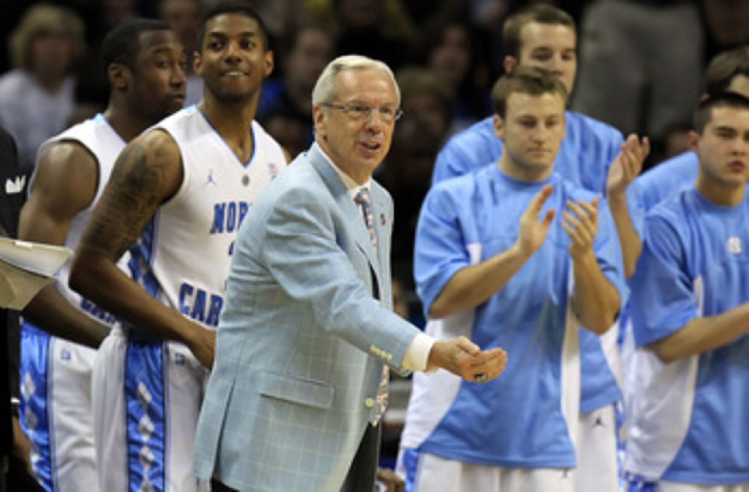 CHARLOTTE, NC - MARCH 20: Head coach Roy Williams of the North Carolina Tar Heels reacts in the first half while taking on the Washington Huskies during the third round of the 2011 NCAA men's basketball tournament at Time Warner Cable Arena on March 20, CHARLOTTE, NC - MARCH 20: Head coach Roy Williams of the North Carolina Tar Heels reacts in the first half while taking on the Washington Huskies during the third round of the 2011 NCAA men's basketball tournament at Time Warner Cable Arena on March 20,