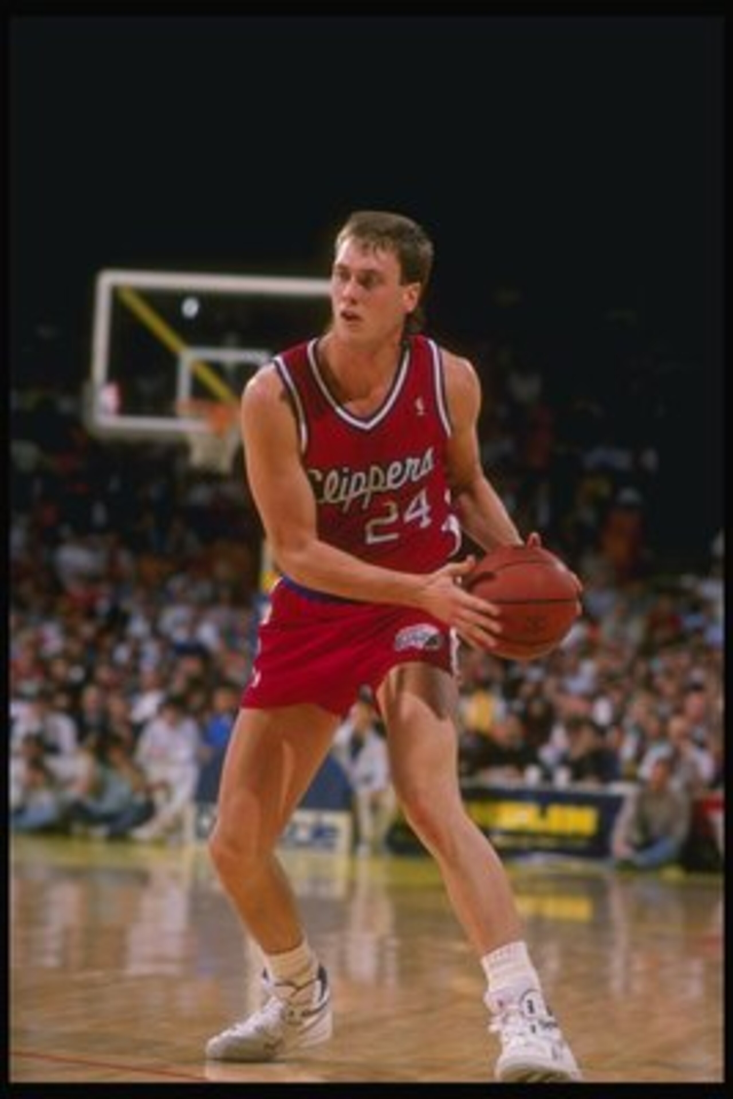 1989-1990: Forward Joe Wolf of the Los Angeles Clippers in action with the ball during a game versus the Los Angeles Lakers at the Great Western Forum in Inglewood, California. Mandatory Credit: Mike Powell /Allsport 1989-1990: Forward Joe Wolf of the Los Angeles Clippers in action with the ball during a game versus the Los Angeles Lakers at the Great Western Forum in Inglewood, California. Mandatory Credit: Mike Powell /Allsport
