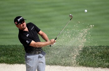 BETHESDA, MD - JUNE 13:  Graeme McDowell of Northern Ireland plays a bunker shot during a practice round prior to the start of the 111th U.S. Open at Congressional Country Club on June 13, 2011 in Bethesda, Maryland.  (Photo by Ross Kinnaird/Getty Images)