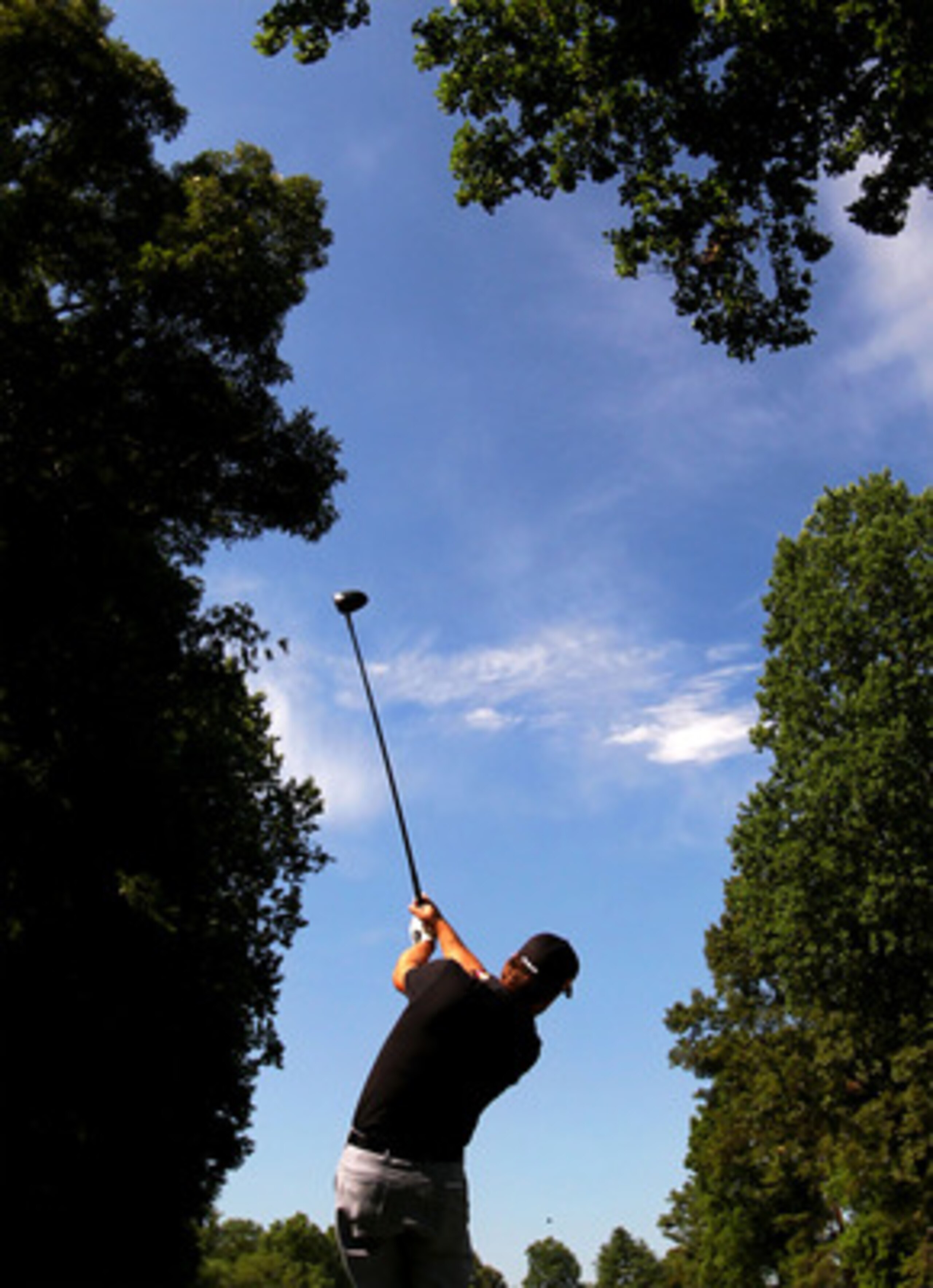 BETHESDA, MD - JUNE 13:  Graeme McDowell of Northern Ireland plays a shot during a practice round prior to the start of the 111th U.S. Open at Congressional Country Club on June 13, 2011 in Bethesda, Maryland.  (Photo by Ross Kinnaird/Getty Images)