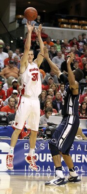 INDIANAPOLIS, IN - MARCH 11:  Jon Leuer #30 of the Wisconsin Badgers attempts a shot against the Penn State Nittany Lions during the quarterfinals of the 2011 Big Ten Men's Basketball Tournament at Conseco Fieldhouse on March 11, 2011 in Indianapolis, Ind