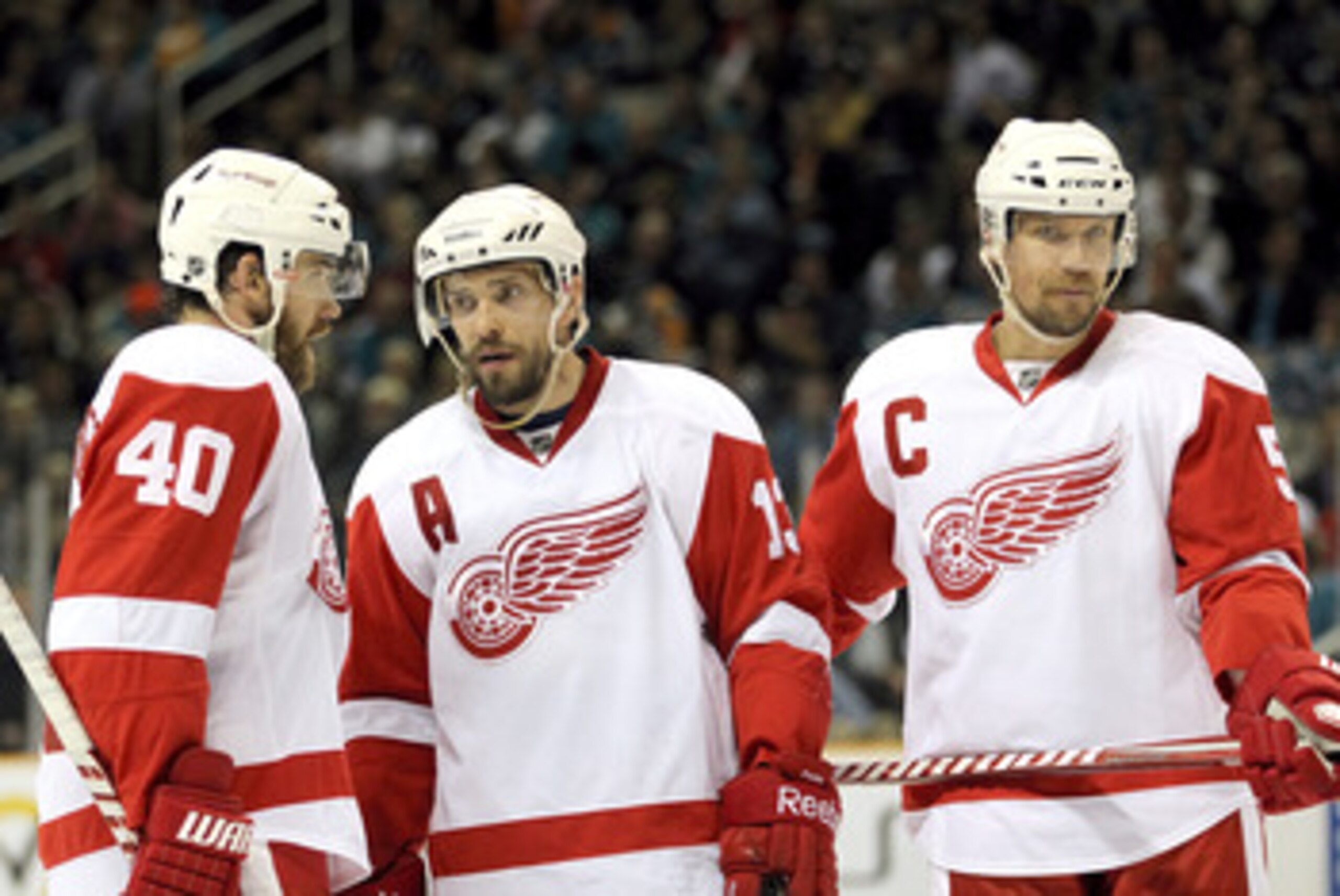SAN JOSE, CA - MAY 12:  Henrik Zetterberg #40, Pavel Datsyuk #13, and Nicklas Lidstrom #5 of the Detroit Red Wings talk to each other before a face off against the San Jose Sharks in Game Seven of the Western Conference Semifinals during the 2011 NHL Stan