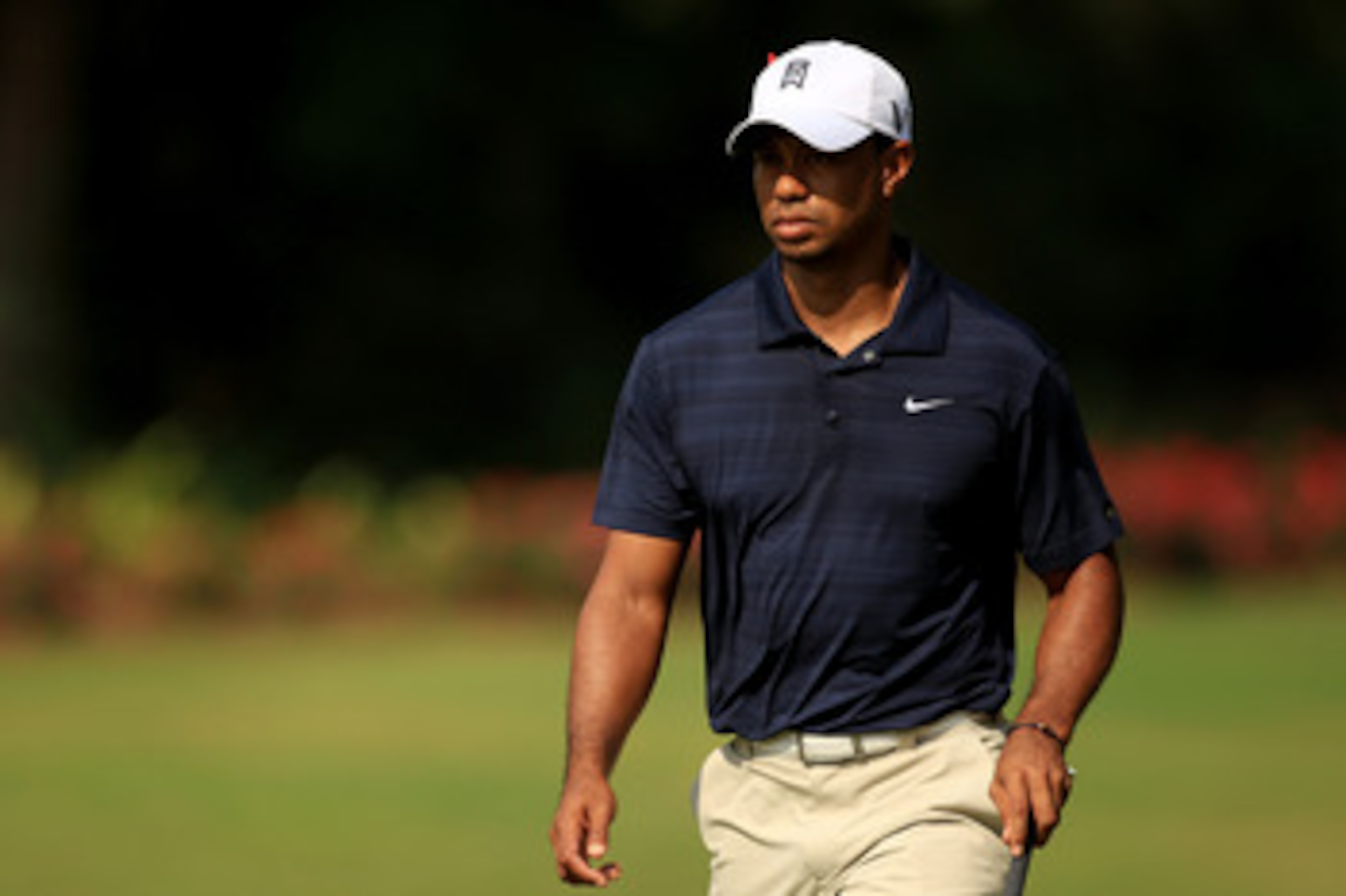 PONTE VEDRA BEACH, FL - MAY 12:  Tiger Woods walks up the eighth hole during the first round of THE PLAYERS Championship held at THE PLAYERS Stadium course at TPC Sawgrass on May 12, 2011 in Ponte Vedra Beach, Florida.  (Photo by Streeter Lecka/Getty Imag