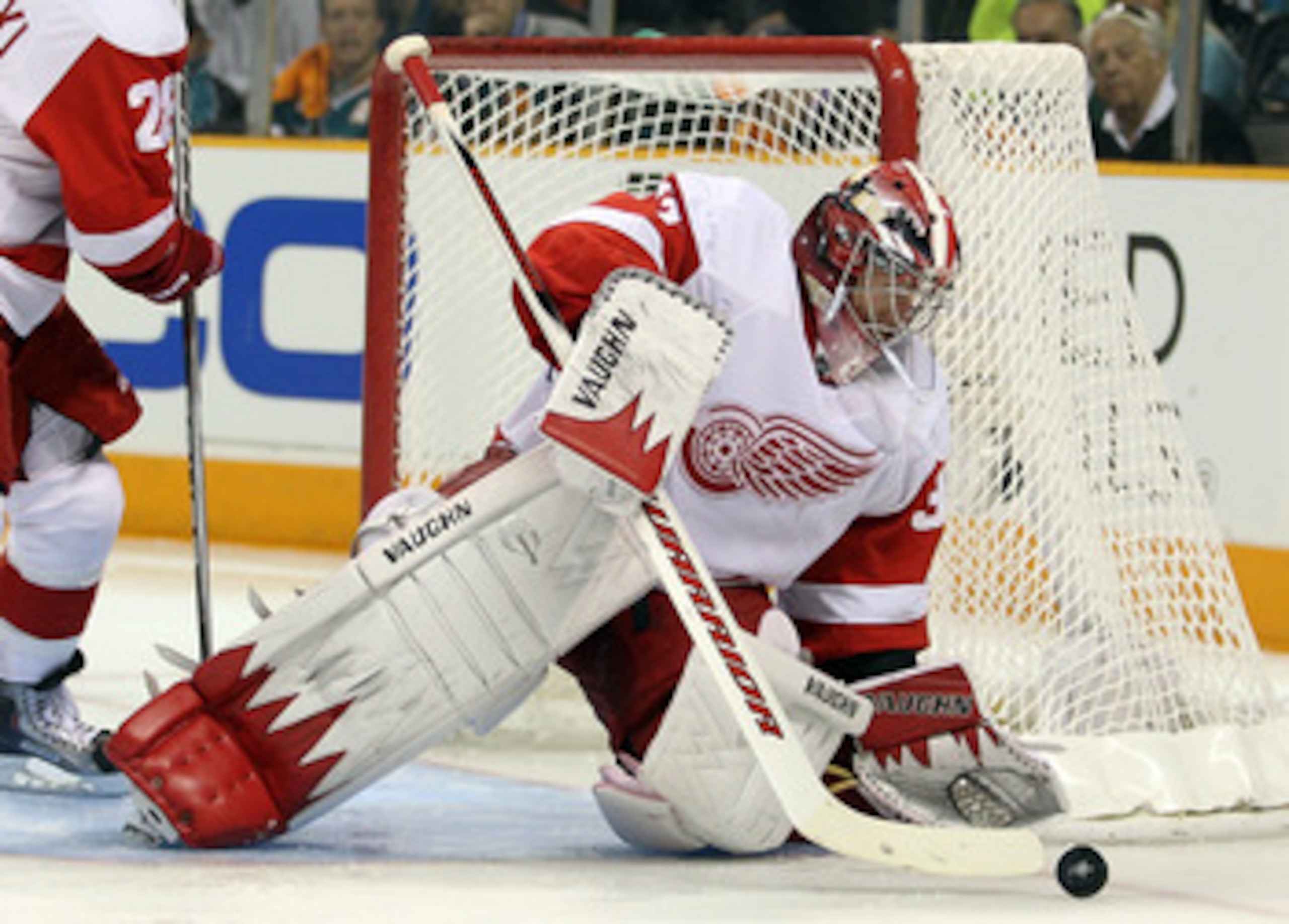 SAN JOSE, CA - MAY 12:  Jimmy Howard #35 of the Detroit Red Wings makes a save against the San Jose Sharks in Game Seven of the Western Conference Semifinals during the 2011 NHL Stanley Cup Playoffs at HP Pavilion on May 12, 2011 in San Jose, California. 
