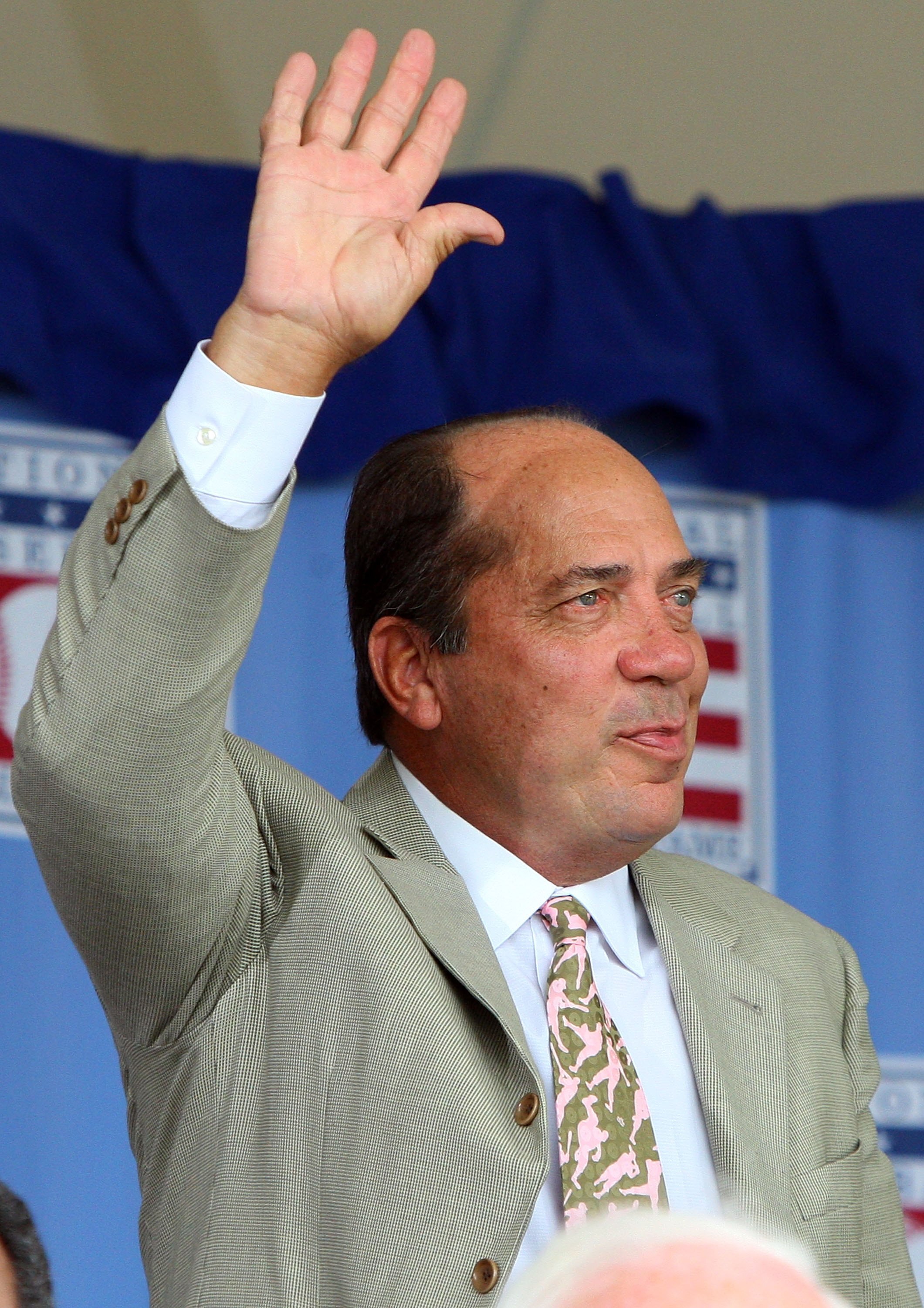 COOPERSTOWN, NY - JULY 26:  Hall of Famer Johnny Bench waves to the crowd as he is introduced at Clark Sports Center during the 2009  Baseball Hall of Fame induction ceremony on July 26, 2009 in Cooperstown, New York.  (Photo by Jim McIsaac/Getty Images)