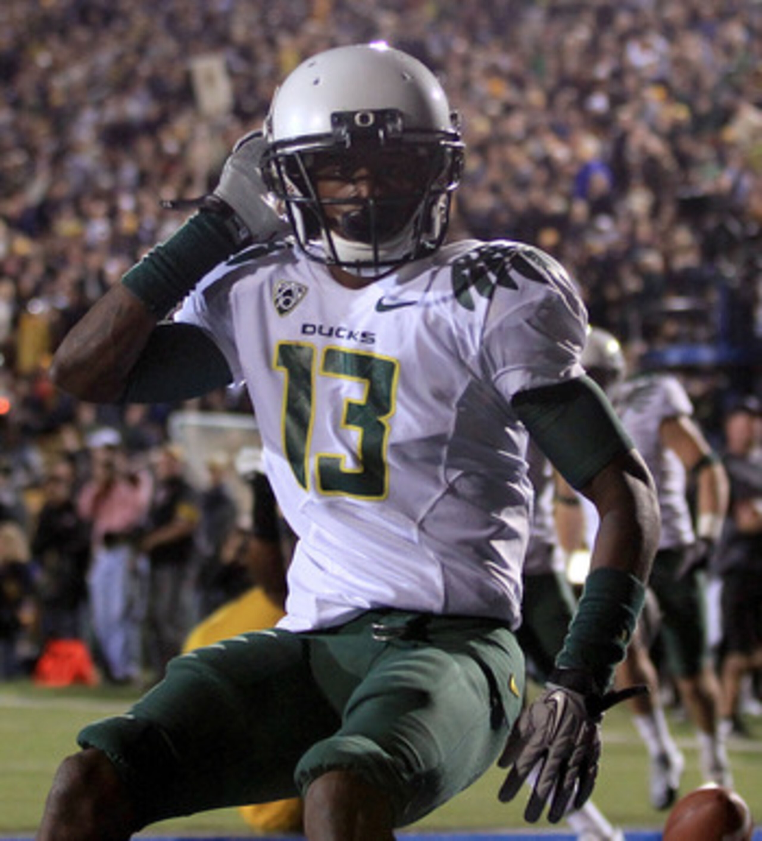 BERKELEY, CA - NOVEMBER 13:  Cliff Harris #13 of the Oregon Ducks celebrates after he returned a punt for a touchdown against the California Golden Bears  at California Memorial Stadium on November 13, 2010 in Berkeley, California.  (Photo by Ezra Shaw/Ge