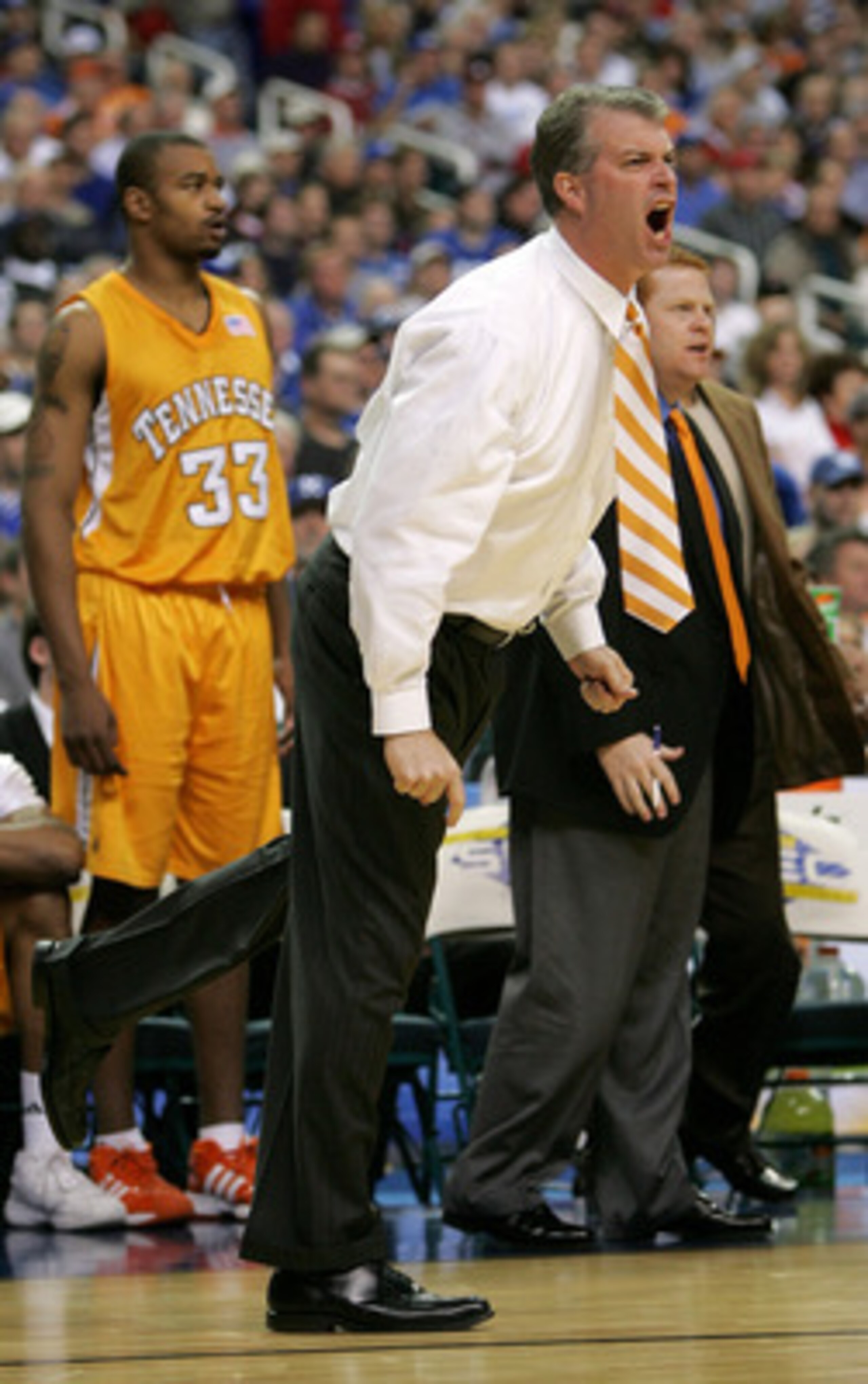 ATLANTA - MARCH 11: Head coach Buzz Peterson of the Tennessee Volunteers reacts to a call in the game against the Kentucky Wildcats during the quarterfinals of the SEC Men's Basketball Tournament at the Georgia Dome on March 11, 2005 in Atlanta, Georgia. ATLANTA - MARCH 11: Head coach Buzz Peterson of the Tennessee Volunteers reacts to a call in the game against the Kentucky Wildcats during the quarterfinals of the SEC Men's Basketball Tournament at the Georgia Dome on March 11, 2005 in Atlanta, Georgia.