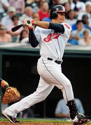 CLEVELAND, OH - JUNE 6: Asdrubal Cabrera #13 of the Cleveland Indians hits a single during the third inning against the Minnesota Twins  at Progressive Field on June 6, 2011 in Cleveland, Ohio. The Twins beat the Indians 6-4. (Photo by Jason Miller/Getty 
