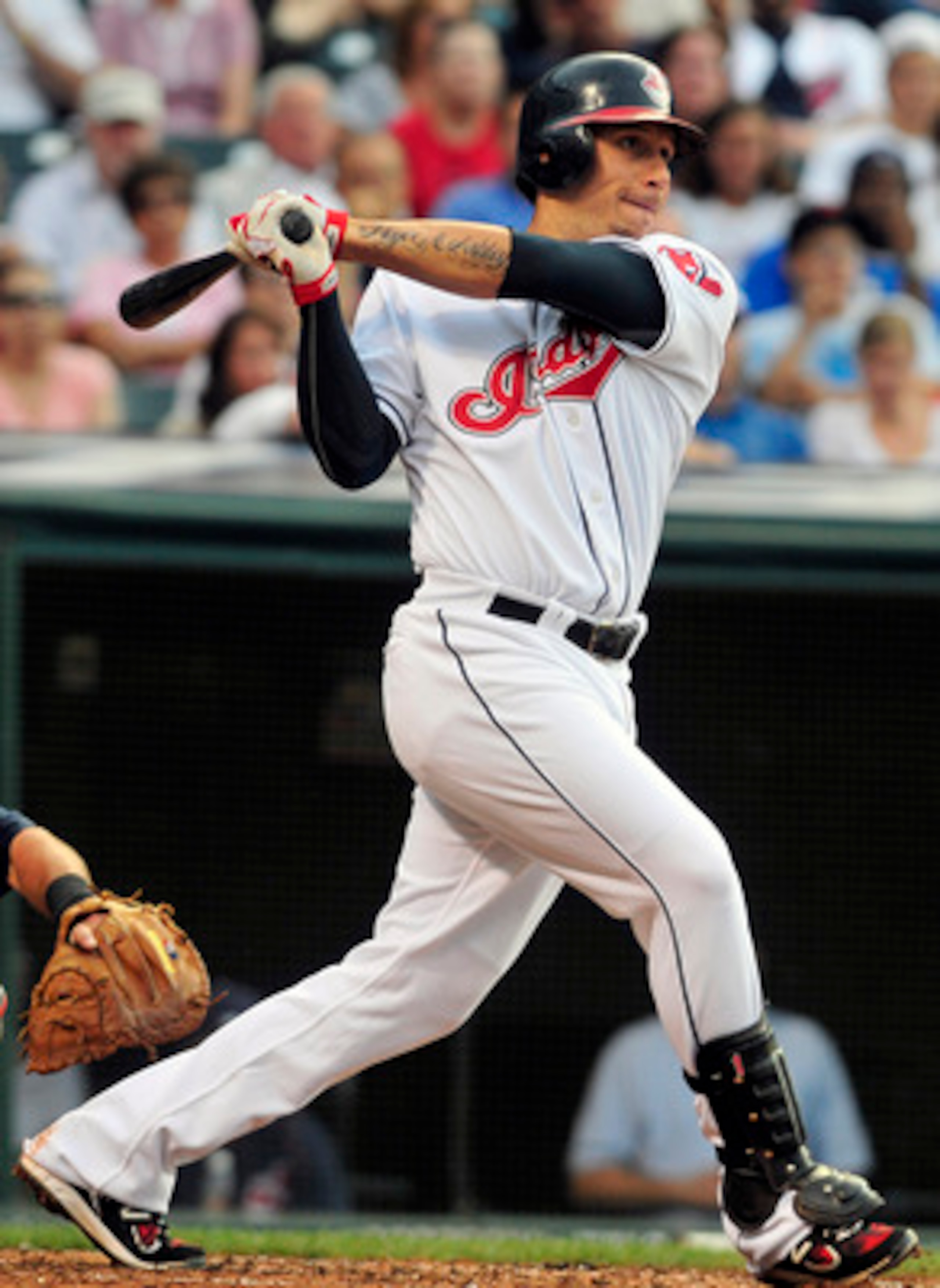 CLEVELAND, OH - JUNE 6: Asdrubal Cabrera #13 of the Cleveland Indians hits a single during the third inning against the Minnesota Twins  at Progressive Field on June 6, 2011 in Cleveland, Ohio. The Twins beat the Indians 6-4. (Photo by Jason Miller/Getty 