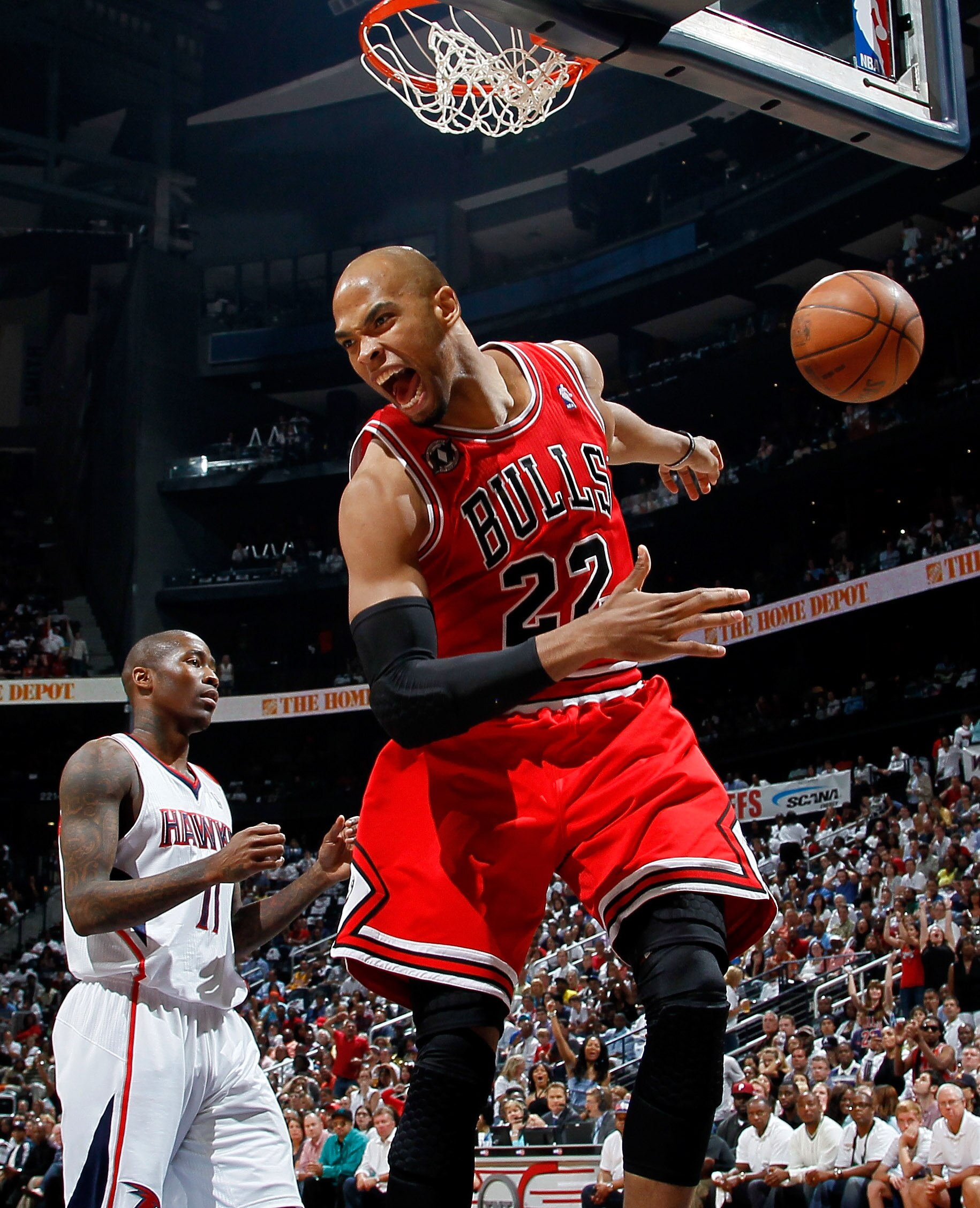 ATLANTA, GA - MAY 08:  Taj Gibson #22 of the Chicago Bulls reacts after dunking off a steal from Jamal Crawford #11 of the Atlanta Hawks in Game Four of the Eastern Conference Semifinals in the 2011 NBA Playoffs at Phillips Arena on May 8, 2011 in Atlanta