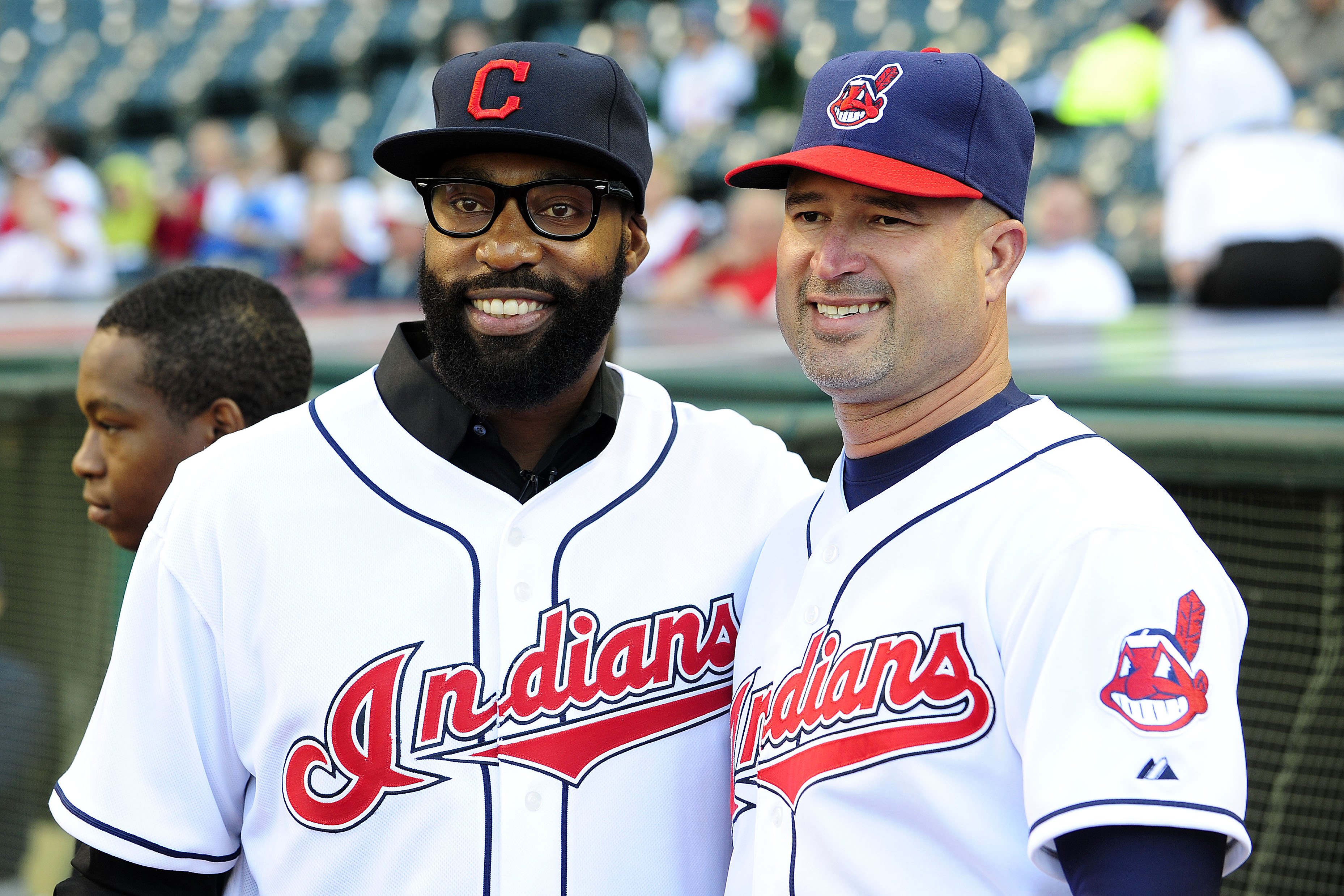 CLEVELAND, OH - JUNE 2:  (L-R) Cleveland Cavaliers guard Baron Davis poses for a photo with Cleveland Indians Manager Manny Acta #11 of the Cleveland Indians at Progressive Field on June 2, 2011 in Cleveland, Ohio. (Photo by Jason Miller/Getty Images)