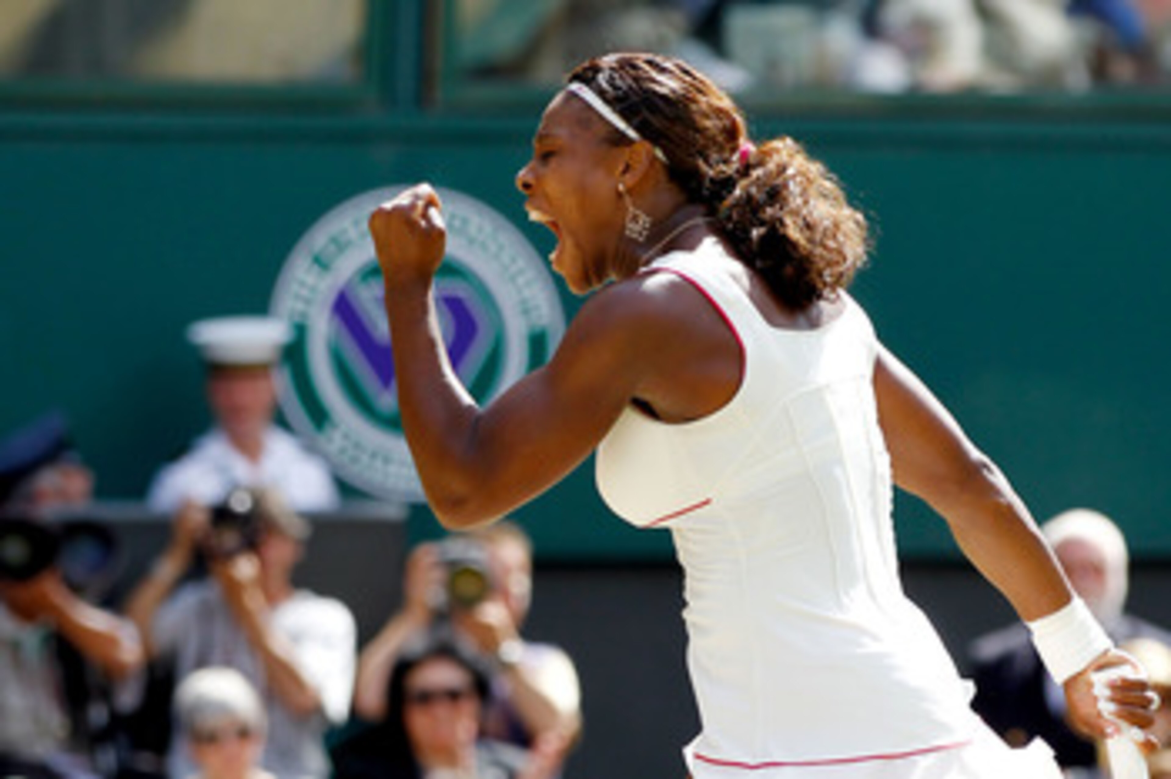 LONDON, ENGLAND - JULY 03: Serena Williams of USA celebrates a point during the Ladies Singles Final Match against Vera Zvonareva of Russia on Day Twelve of the Wimbledon Lawn Tennis Championships at the All England Lawn Tennis and Croquet Club on July 3 LONDON, ENGLAND - JULY 03: Serena Williams of USA celebrates a point during the Ladies Singles Final Match against Vera Zvonareva of Russia on Day Twelve of the Wimbledon Lawn Tennis Championships at the All England Lawn Tennis and Croquet Club on July 3