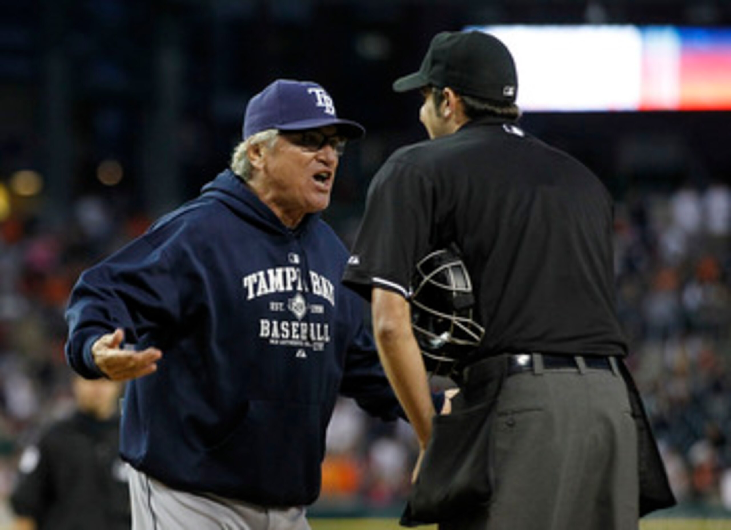 DETROIT - JUNE 13:  Tampa Bay Rays manager Joe Maddon #70 argues with home plate umpire John Tumpane #74 after a close play at the plate in the seventh inning during the game at Comerica Park on June 13, 2011 in Detroit, Michigan. The Tigers defeated the