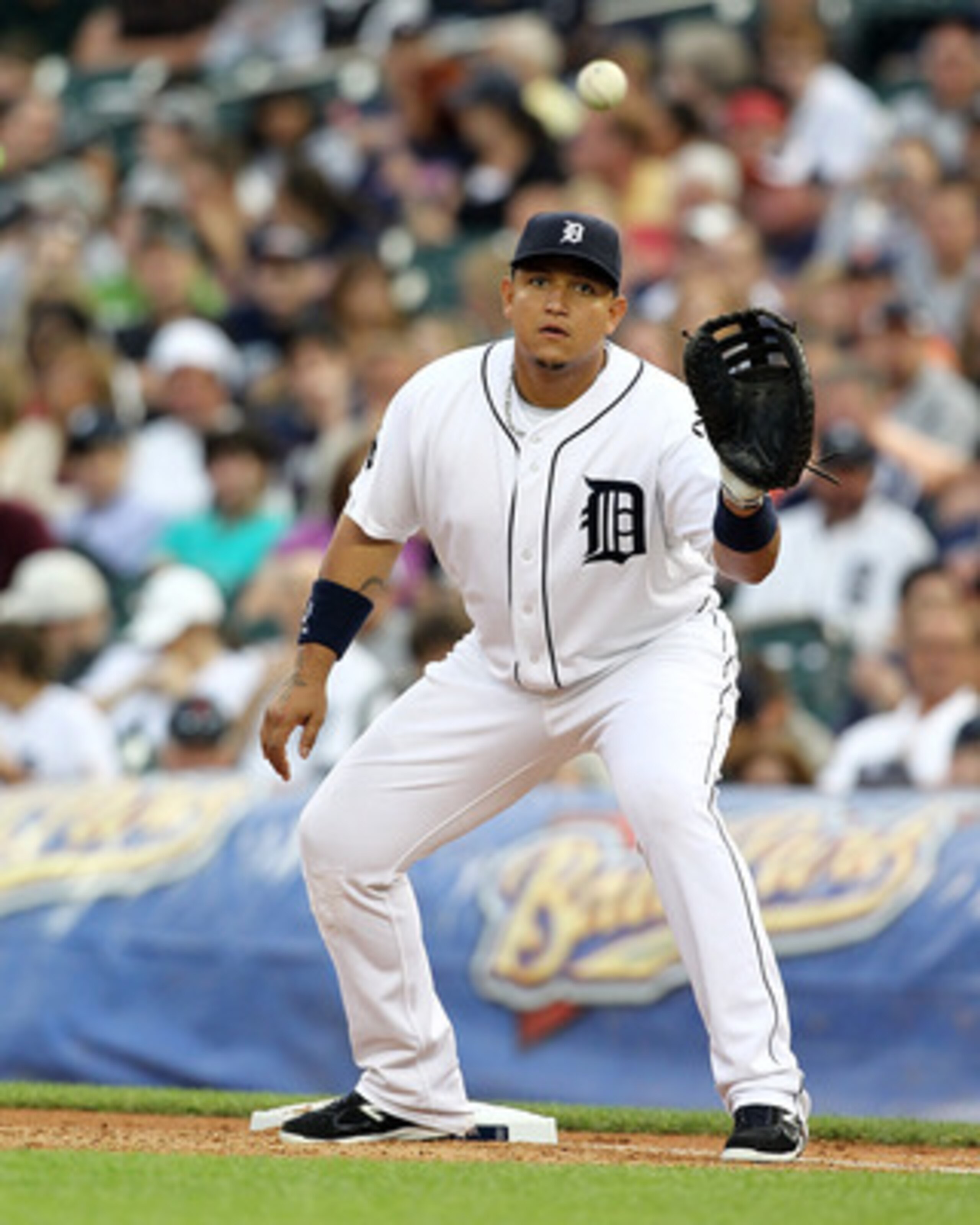 DETROIT, MI - JUNE 09:  Miguel Cabrera #24 of the Detroit Tigers catches the ball at first base in a MLB game against the Seattle Mariners at Comerica Park on June 9, 2011 in Detroit, Michigan.  The Tigers defeated the Mariners 4-1  (Photo by Dave Reginek