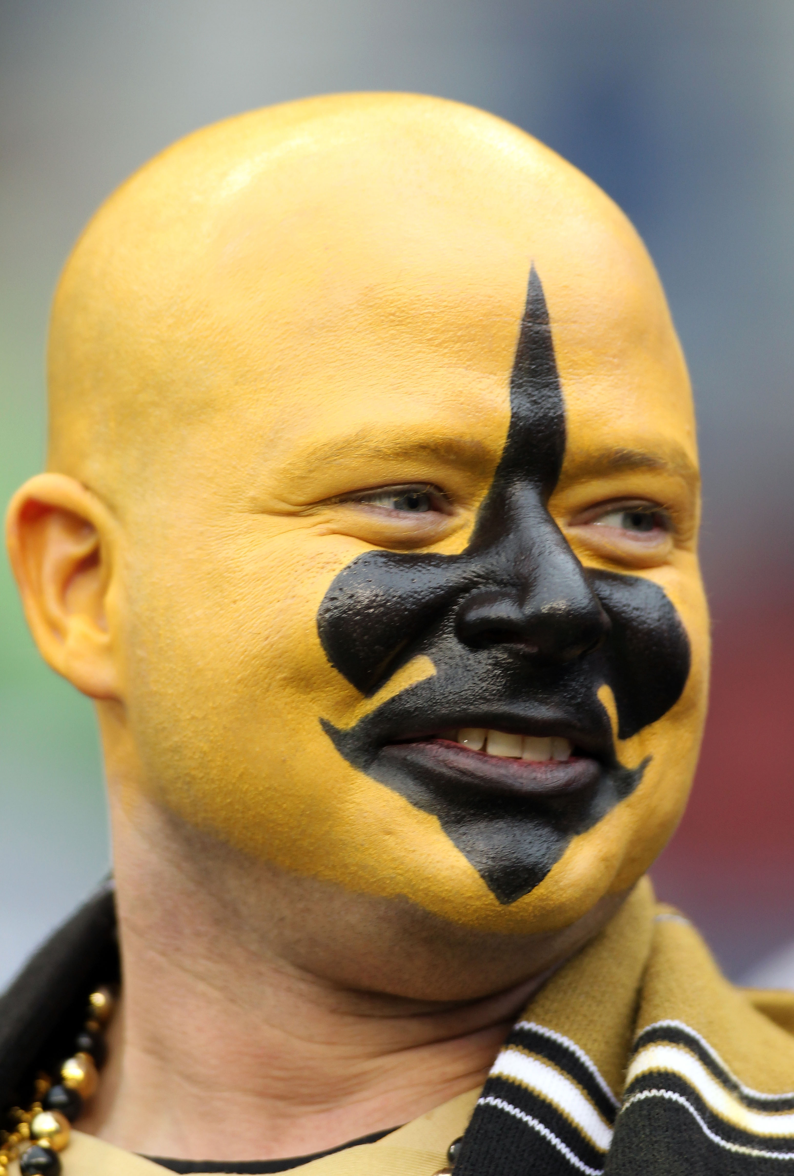 SEATTLE, WA - JANUARY 08:  A New Orleans Saints fan smiles before the Saints take on the Seattle Seahawks during the 2011 NFC wild-card playoff game at Qwest Field on January 8, 2011 in Seattle, Washington.  (Photo by Jonathan Ferrey/Getty Images)