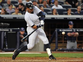 NEW YORK, NY - JUNE 10: Alex Rodriguez #13 of the New York Yankees  connects for a solo home run in the bottom of the fourth inning against the Cleveland Indians on June 10, 2011 at Yankee Stadium in the Bronx borough of New York City. (Photo by Christoph