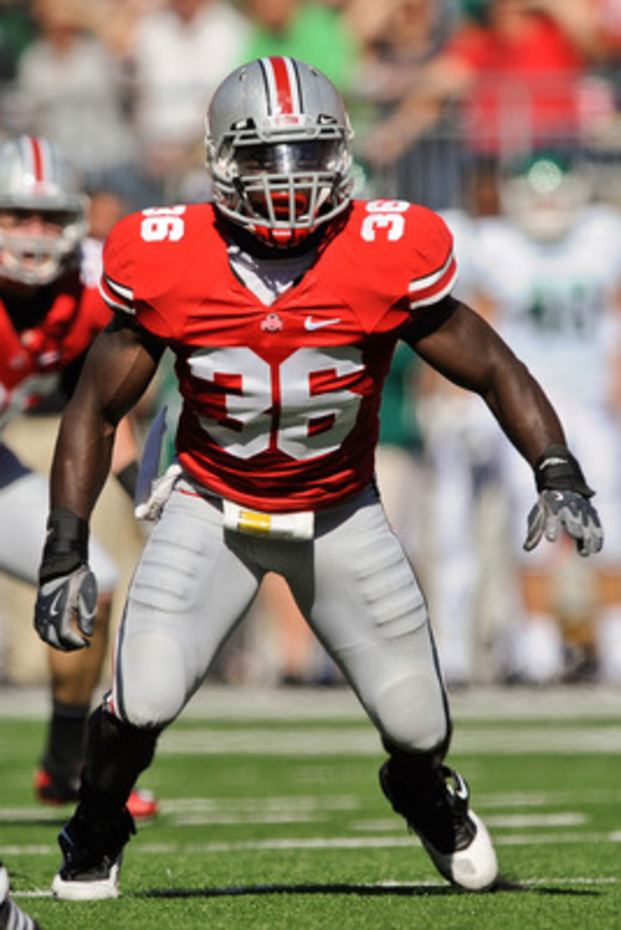 COLUMBUS, OH - SEPTEMBER 25:  Brian Rolle #36 of the Ohio State Buckeyes defends against the Eastern Michigan Eagles at Ohio Stadium on September 25, 2010 in Columbus, Ohio.  Ohio State won 73-20. (Photo by Jamie Sabau/Getty Images)