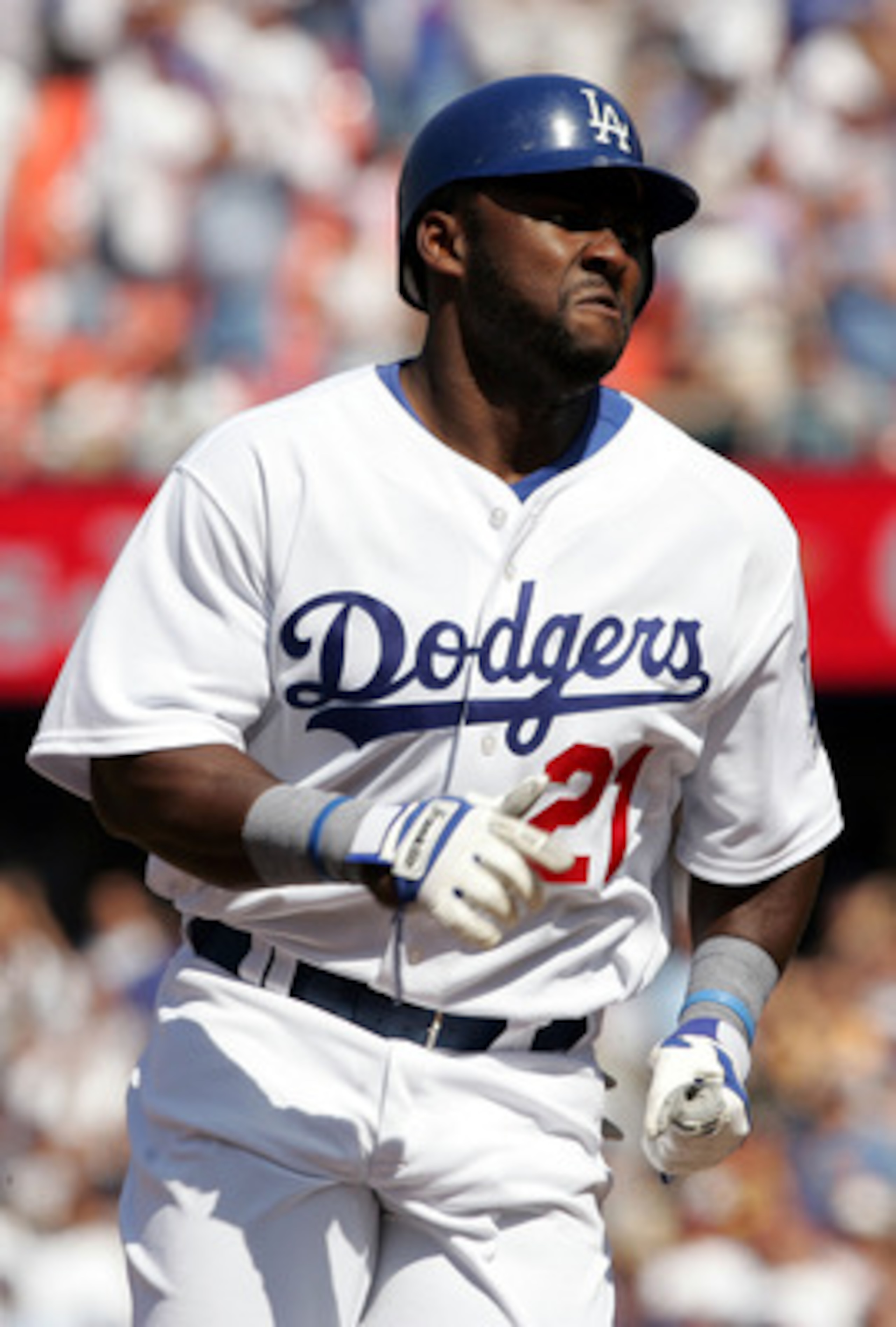 LOS ANGELES - APRIL 12:  Milton Bradley #21 of the Los Angeles Dodgers runs the bases during the Dodgers home opener against the San Francisco Giants at Dodger Stadium on April 12, 2005 in Los Angeles, California. The Dodgers defeated the Giants 9-8.(Phot