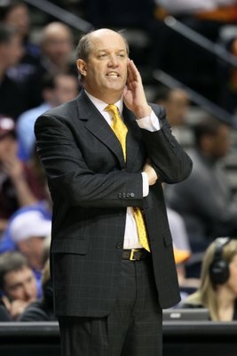 NASHVILLE, TN - MARCH 13:  Head coach Kevin Stallings of the Vanderbilt Commodores reacts as he coaches against the Mississippi State Bulldogs during the semirfinals of the SEC Men's Basketball Tournament at the Bridgestone Arena on March 13, 2010 in Nash