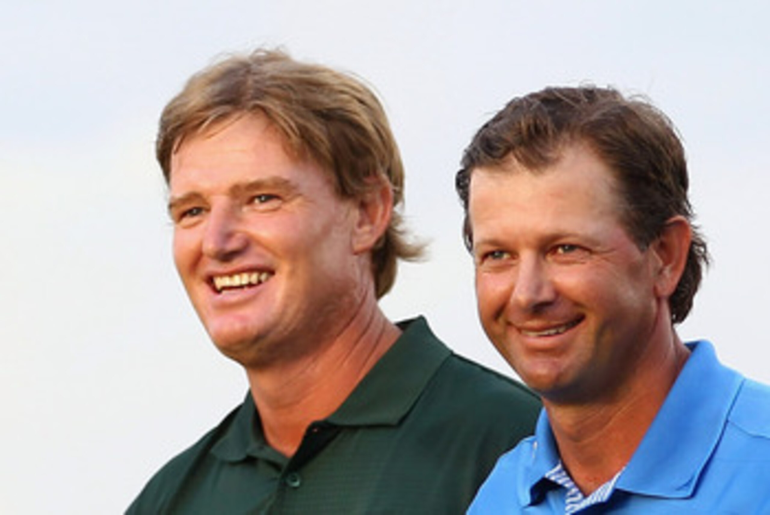 DURBAN, SOUTH AFRICA - DECEMBER 19:  Ernie Els of South Africa is congratulated by Retief Goosen of South Africa after the final round during the South African Open Golf Championship at the Durban Country Club on December 19, 2010 in Durban, South Africa.
