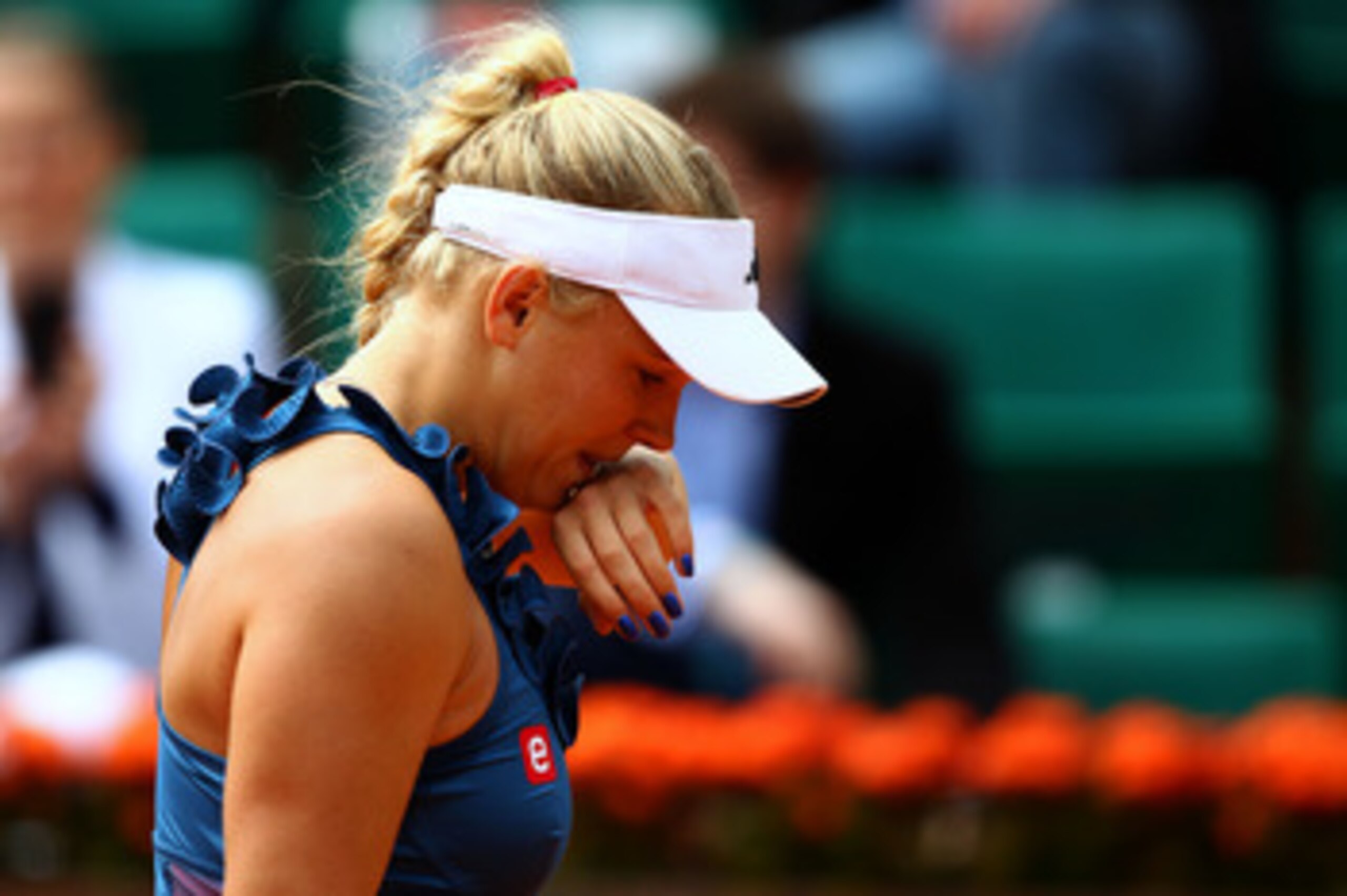 PARIS, FRANCE - MAY 27:  Caroline Wozniacki of Denmark shows her dejection during the women's singles round three match between Caroline Wozniacki of Denmark and Daniela Hantuchova of Slovakia on day six of the French Open at Roland Garros on May 27, 2011