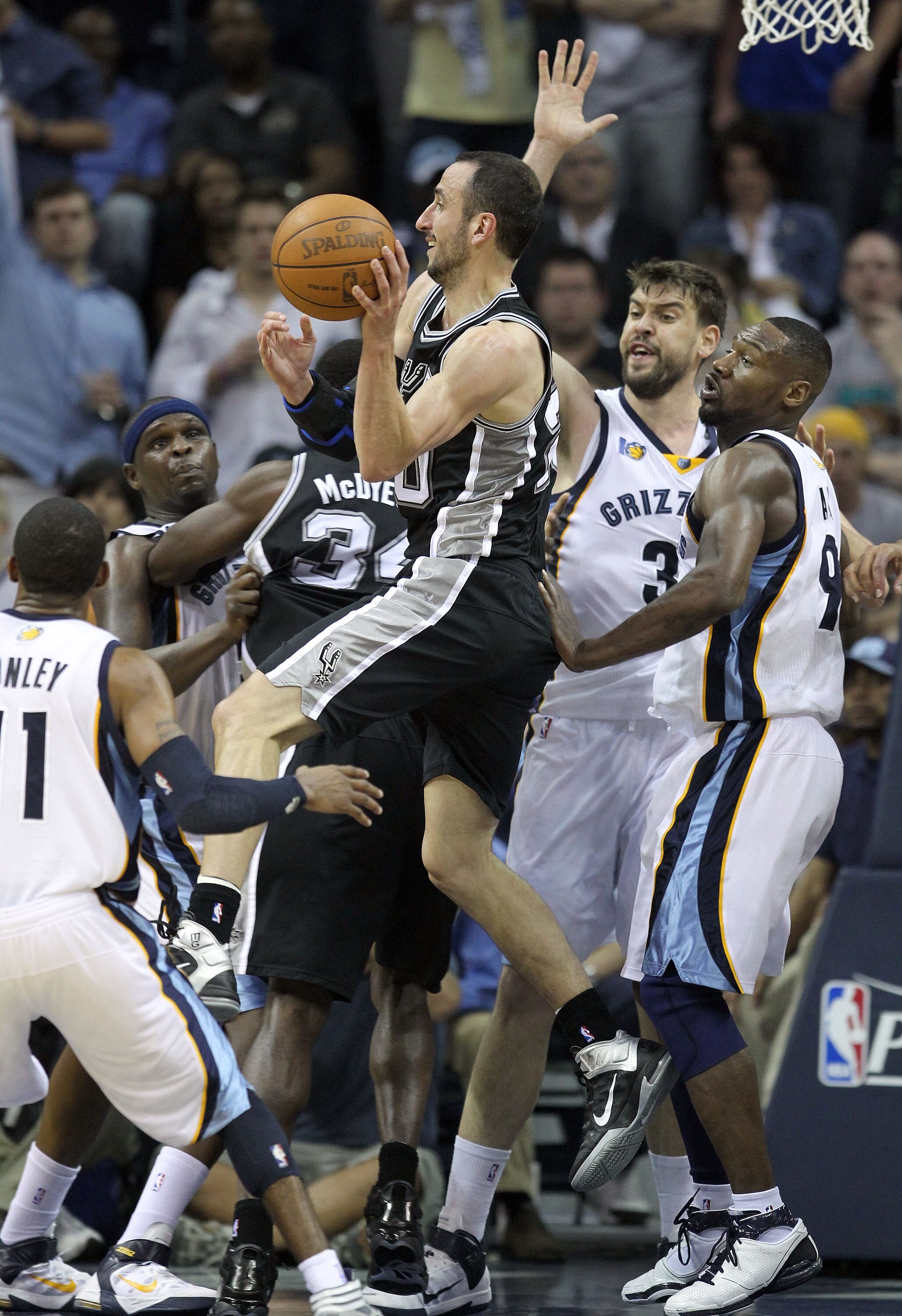 MEMPHIS, TN - APRIL 25:  Manu Ginobili #20 of the San Antonio Spurs passes the ball during the game against the Memphis Grizzlies in Game Four of the Western Conference Quarterfinals in the 2011 NBA Playoffs at FedExForum on April 25, 2011 in Memphis, Ten
