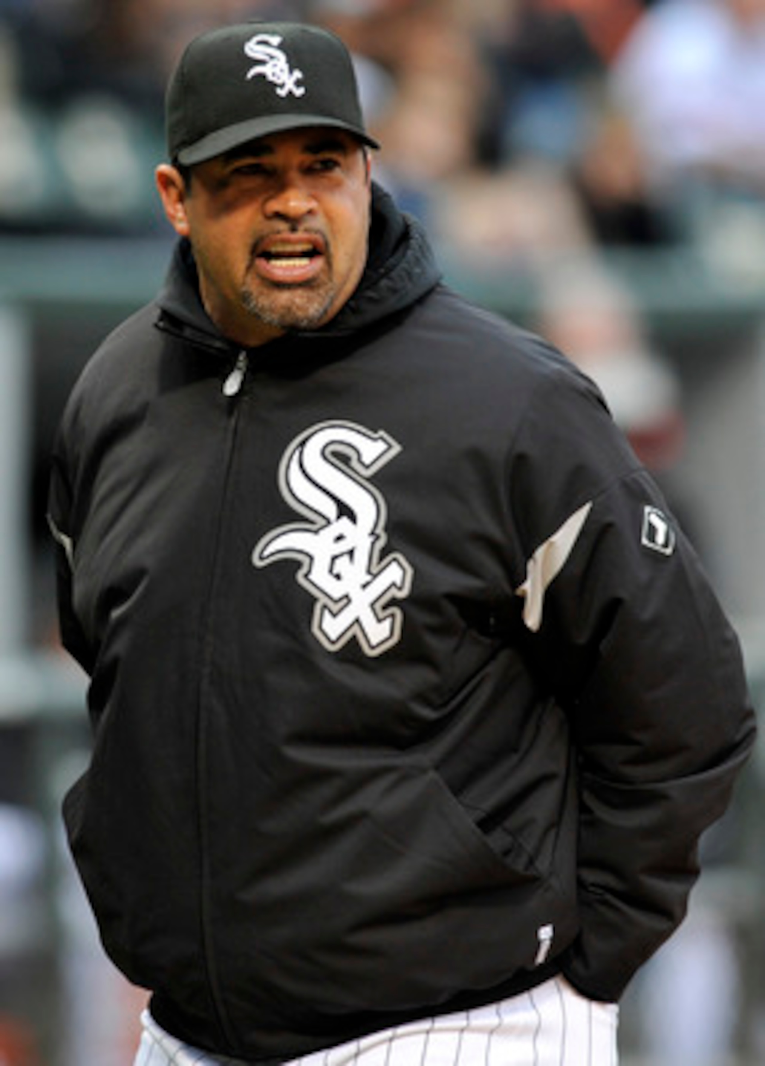 CHICAGO, IL - JUNE 11: Ozzie Guillen #13 manager of the Chicago White Sox argues a call against the Oakland Athletics on June 11, 2011 at U.S. Cellular Field in Chicago, Illinois.  (Photo by David Banks/Getty Images)