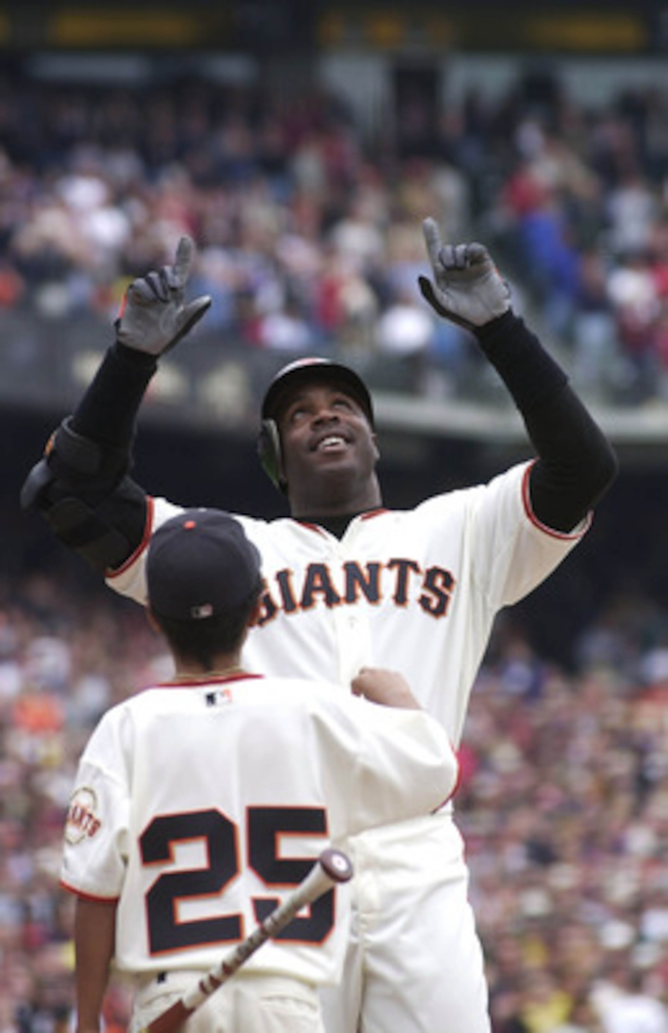 397515 01: (FILE PHOTO) Barry Bonds of the San Francisco Giants (R) celebrates his 73rd home run in front of his son Nikolai October 7, 2001 against the Los Angeles Dodgers at Pacific Bell Park in San Francisco, CA. Bonds won a record 4th Most Valuable Pl