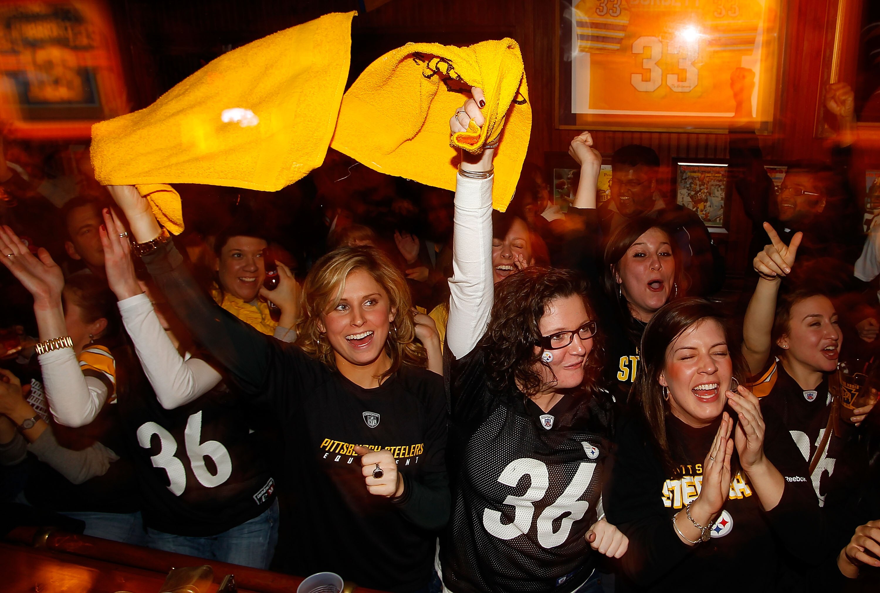 PITTSBURGH - FEBRUARY 06:  Pittsburgh Steelers fans watch Super Bowl XLV on February 6, 2011 at Peter's Pub in the Oakland neighborhood of Pittsburgh, Pennsylvania.  (Photo by Jared Wickerham/Getty Images)