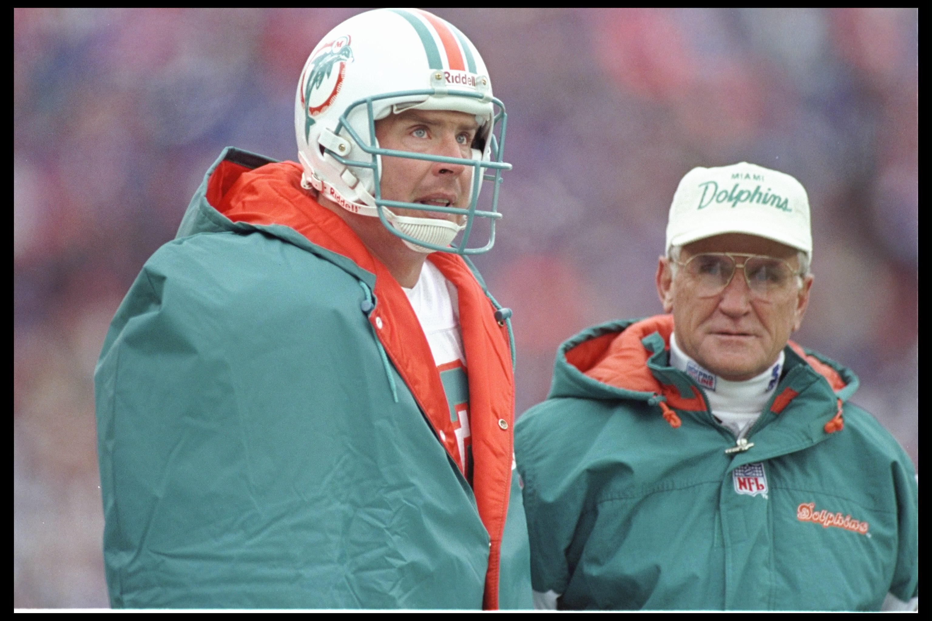 30 Dec 1995:  Quarterback Dan Marino of the Miami Dolphins stands on the sidelines during a game against the Buffalo Bills at Rich Stadium in Orchard Park, New York.  The Bills won the game 37-22. Mandatory Credit: Al Bello  /Allsport