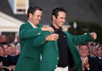 AUGUSTA, GA - APRIL 13:  Trevor Immelman of South Africa has a green jacket placed on him by Zach Johnson after winning the 2008 Masters Tournament at Augusta National Golf Club on April 13, 2008 in Augusta, Georgia.  (Photo by Andy Lyons/Getty Images for