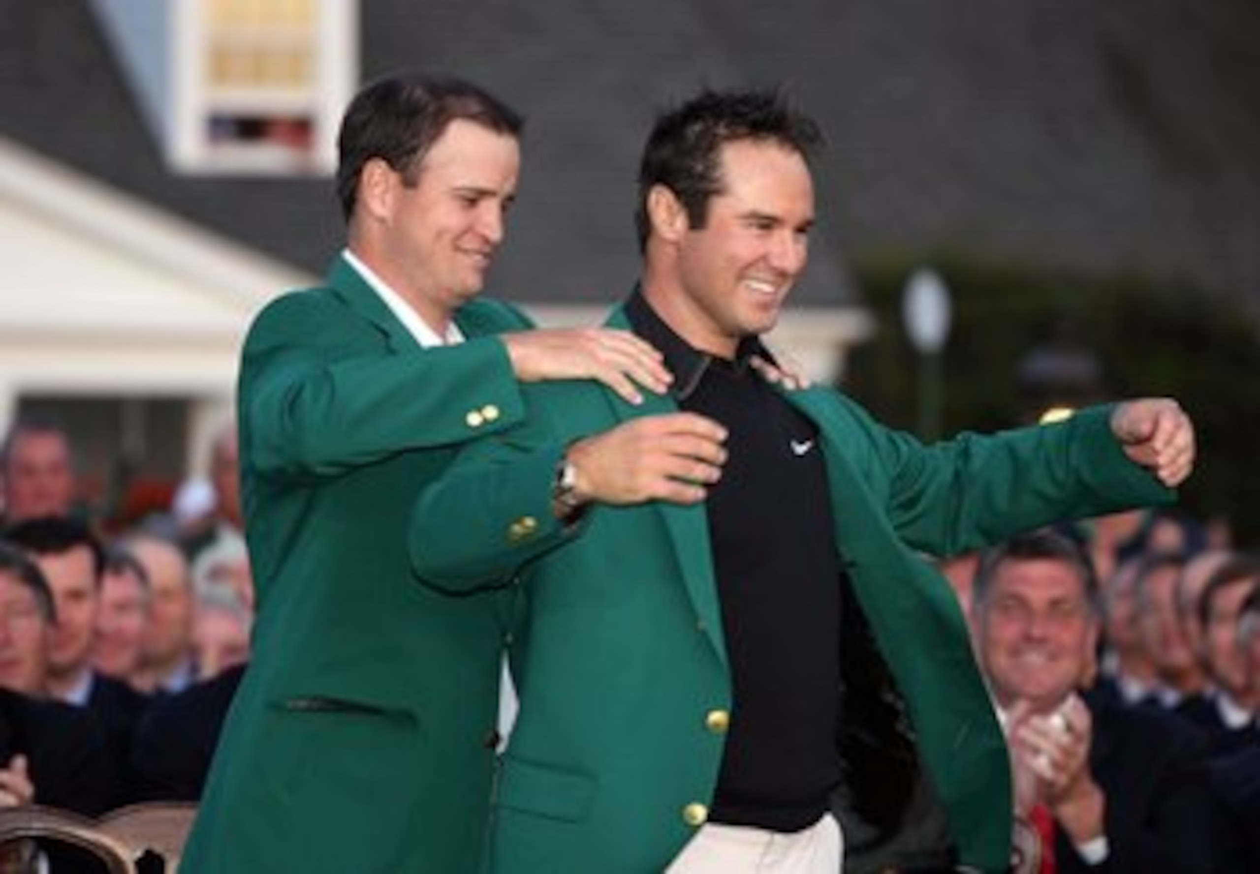 AUGUSTA, GA - APRIL 13:  Trevor Immelman of South Africa has a green jacket placed on him by Zach Johnson after winning the 2008 Masters Tournament at Augusta National Golf Club on April 13, 2008 in Augusta, Georgia.  (Photo by Andy Lyons/Getty Images for