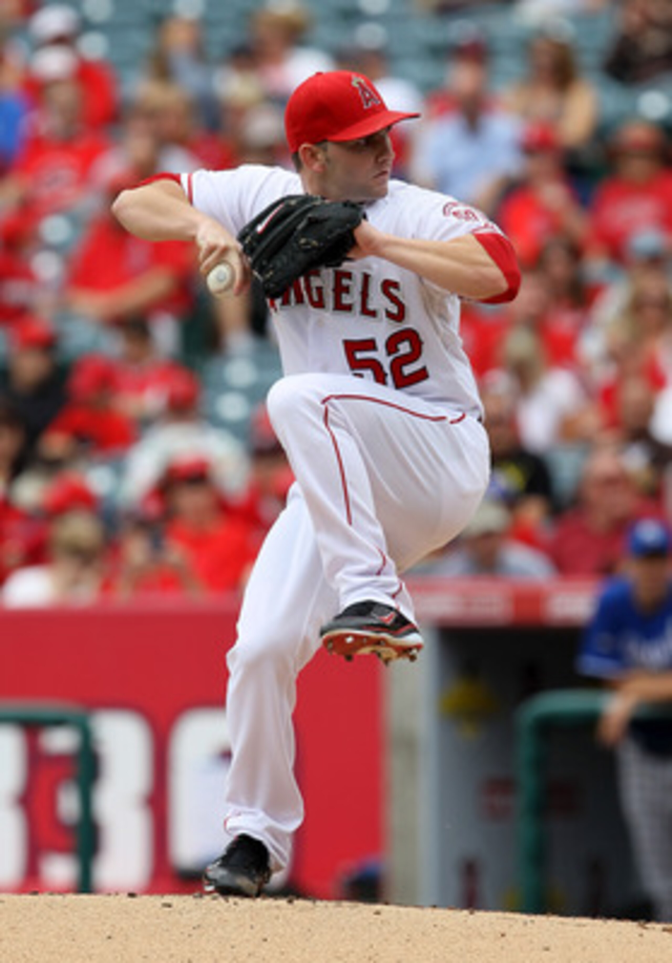 ANAHEIM, CA - JUNE 12:  Tyler Chatwood #52 of the Los Angeles Angels of Anaheim throws a pitch against he Kansas City Royals on June 12, 2011 at Angel Stadium in Anaheim, California.  (Photo by Stephen Dunn/Getty Images)
