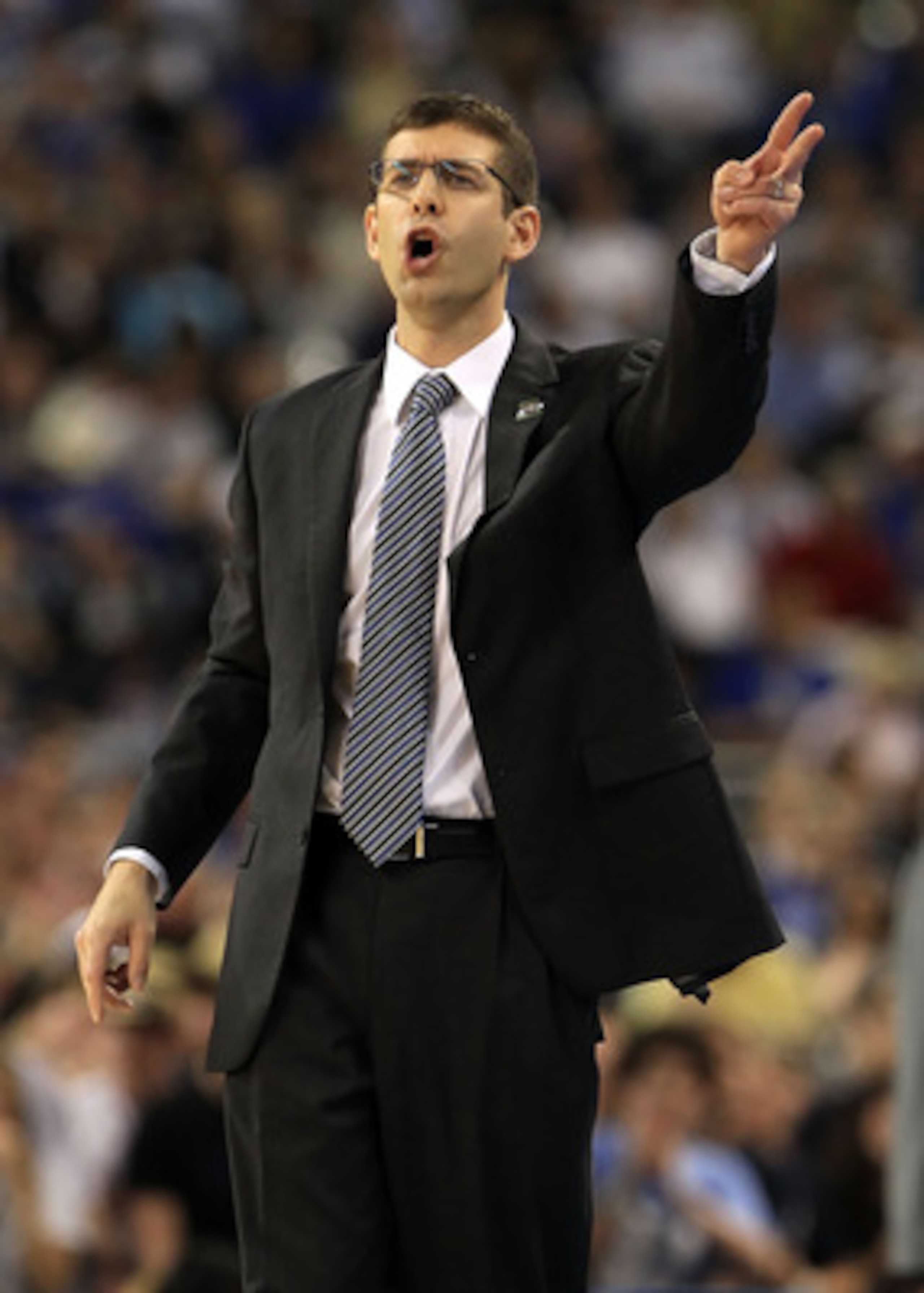 HOUSTON, TX - APRIL 04: Head coach Brad Stevens of the Butler Bulldogs shouts from the sidelines against the Connecticut Huskies during the National Championship Game of the 2011 NCAA Division I Men's Basketball Tournament at Reliant Stadium on April 4, HOUSTON, TX - APRIL 04: Head coach Brad Stevens of the Butler Bulldogs shouts from the sidelines against the Connecticut Huskies during the National Championship Game of the 2011 NCAA Division I Men's Basketball Tournament at Reliant Stadium on April 4,