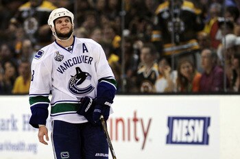 BOSTON, MA - JUNE 08:  Kevin Bieksa #3 of the Vancouver Canucks looks on after a play against the Boston Bruins during Game Four of the 2011 NHL Stanley Cup Final at TD Garden on June 8, 2011 in Boston, Massachusetts.  (Photo by Harry How/Getty Images)