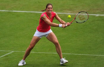 EASTBOURNE, ENGLAND - JUNE 13:  Andrea Petkovic of Germany in action against Venus Williams of USA during Day Three of the AEGON International at Devonshire Park on June 13, 2011 in Eastbourne, England.  (Photo by Mike Hewitt/Getty Images)