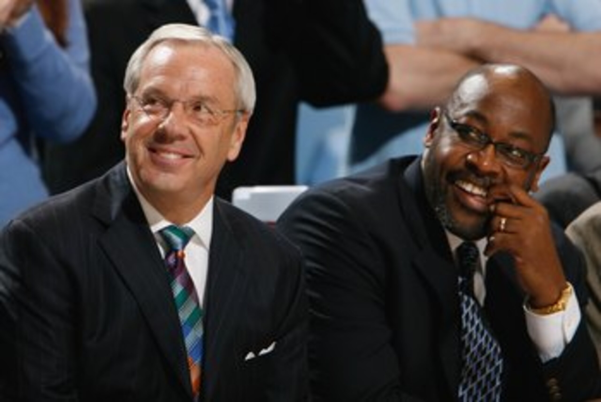 CHAPEL HILL, NC - DECEMBER 19: Head Coach Roy Williams and Assitant Coach Steve Robinson of the North Carolina Tar Heels enjoy the action from the bench during the game against the Nicholls State Colonels during the second half at the Dean E. Smith Cente CHAPEL HILL, NC - DECEMBER 19: Head Coach Roy Williams and Assitant Coach Steve Robinson of the North Carolina Tar Heels enjoy the action from the bench during the game against the Nicholls State Colonels during the second half at the Dean E. Smith Cente