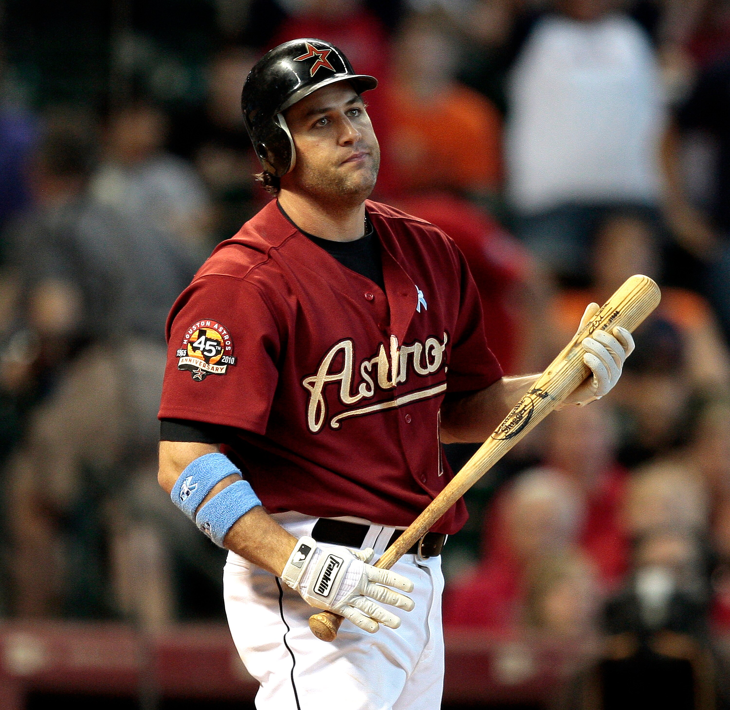 HOUSTON - JUNE 20:  Lance Berkman #17 of the Houston Astros reacts to striking out in the ninth inning against the Texas Rangers at Minute Maid Park on June 20, 2010 in Houston, Texas.  (Photo by Bob Levey/Getty Images)