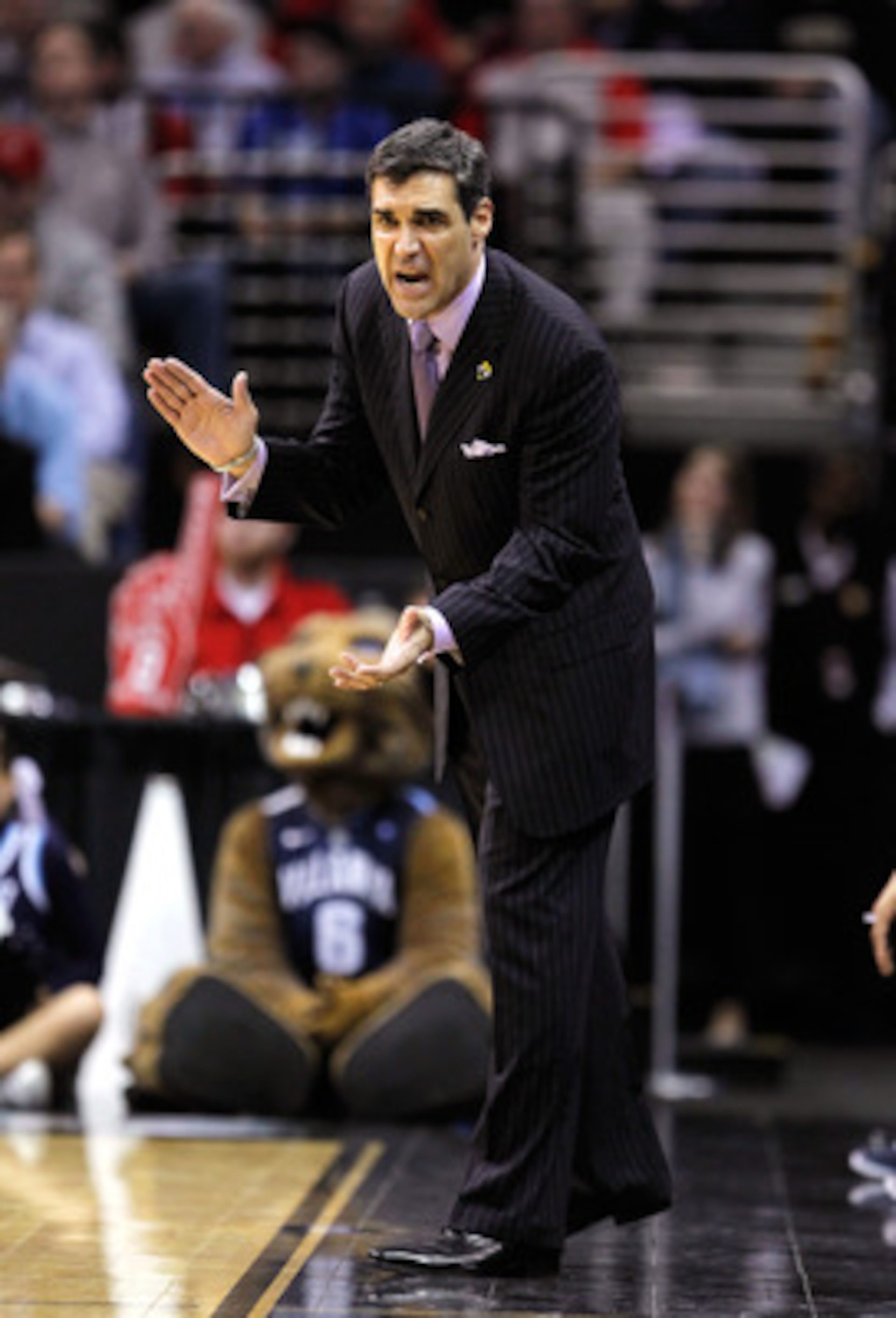 CLEVELAND, OH - MARCH 18: Head coach Jay Wright of the Villanova Wildcats reacts from the bench during the second half against the George Mason Patriots during the second round of the 2011 NCAA men's basketball tournament at Quicken Loans Arena on March 1 CLEVELAND, OH - MARCH 18: Head coach Jay Wright of the Villanova Wildcats reacts from the bench during the second half against the George Mason Patriots during the second round of the 2011 NCAA men's basketball tournament at Quicken Loans Arena on March 1