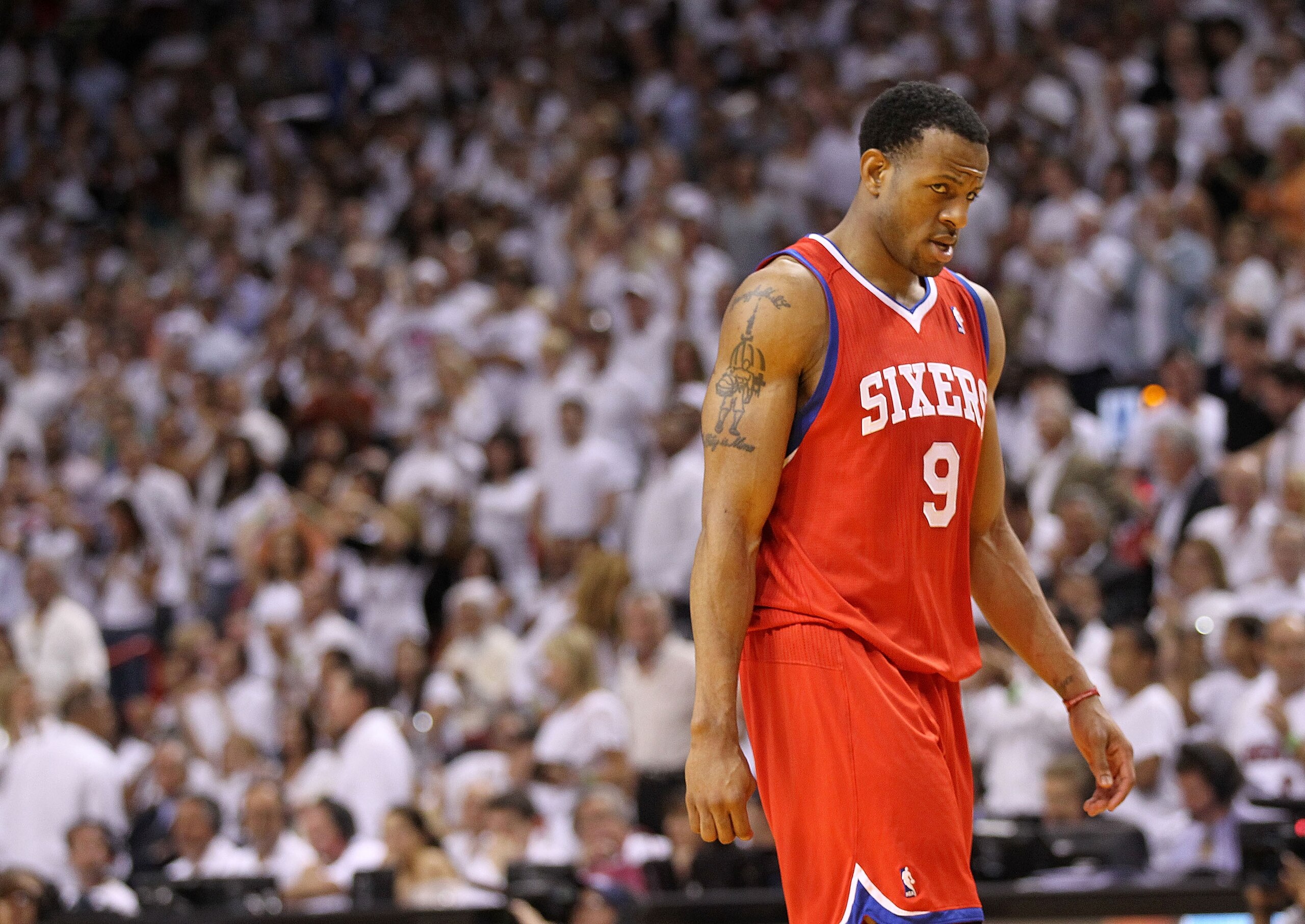 MIAMI, FL - APRIL 27:  Andre Iguodala #9 of the Philadelphia 76ers walks off the floor during game five of the Eastern Conference Quarterfinals in the 2011 NBA Playoffs against the Miami Heat at American Airlines Arena on April 27, 2011 in Miami, Florida.