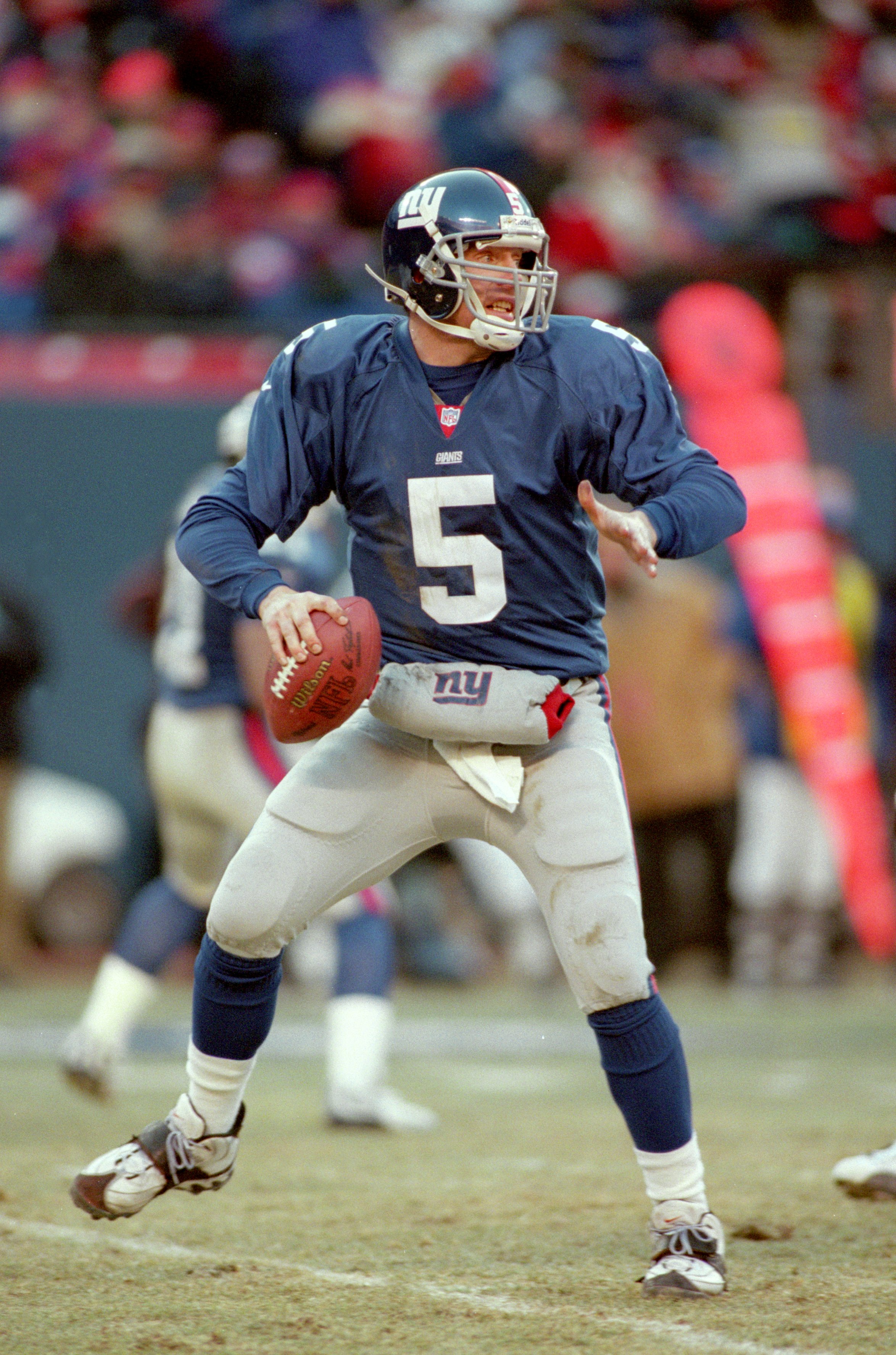 23 Dec 2000:  Quarterback Kerry Collins #5 of the New York Giants moves back to pass the ball during the game against the  Jacksonville Jaguars at the Giants Stadium in East Rutherford, New Jersey.  The Giants defeated the Jaguars 28-26.Mandatory Credit: