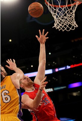 LOS ANGELES, CA - FEBRUARY 25:  Chris Kaman #35 of the Los Angeles Clippers shoots over Pau Gasol #16 of the Los Angeles Lakers at Staples Center on February 25, 2011 in Los Angeles, California. The Lakers won 108-95.  NOTE TO USER: User expressly acknowl