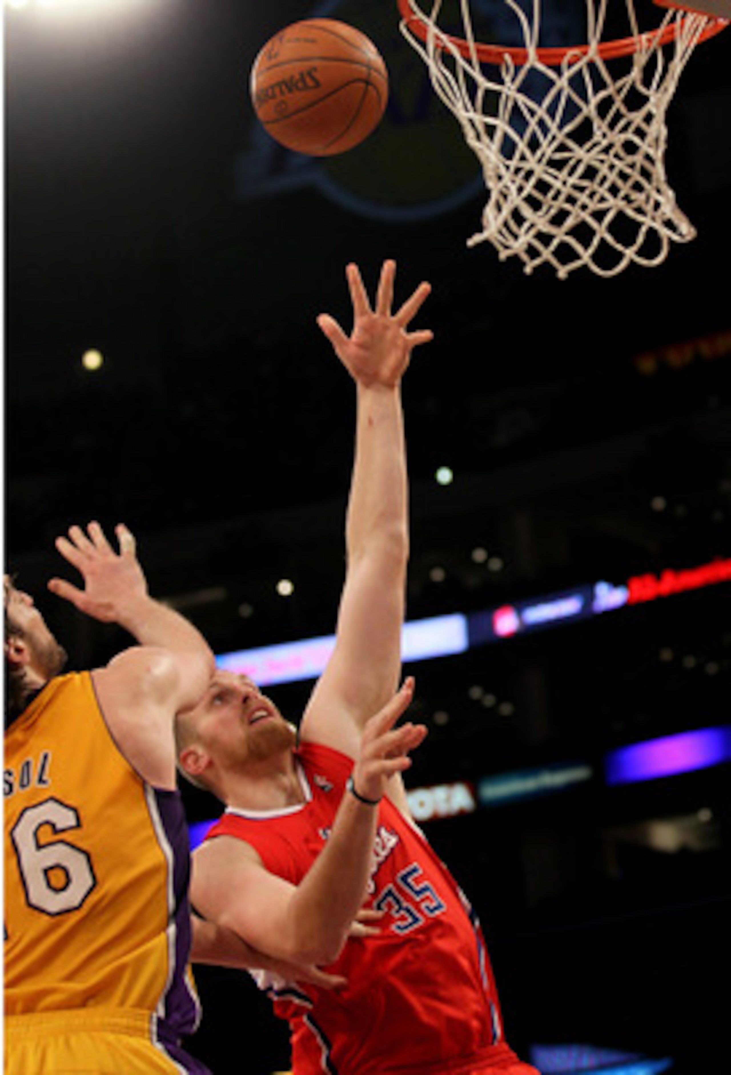 LOS ANGELES, CA - FEBRUARY 25:  Chris Kaman #35 of the Los Angeles Clippers shoots over Pau Gasol #16 of the Los Angeles Lakers at Staples Center on February 25, 2011 in Los Angeles, California. The Lakers won 108-95.  NOTE TO USER: User expressly acknowl