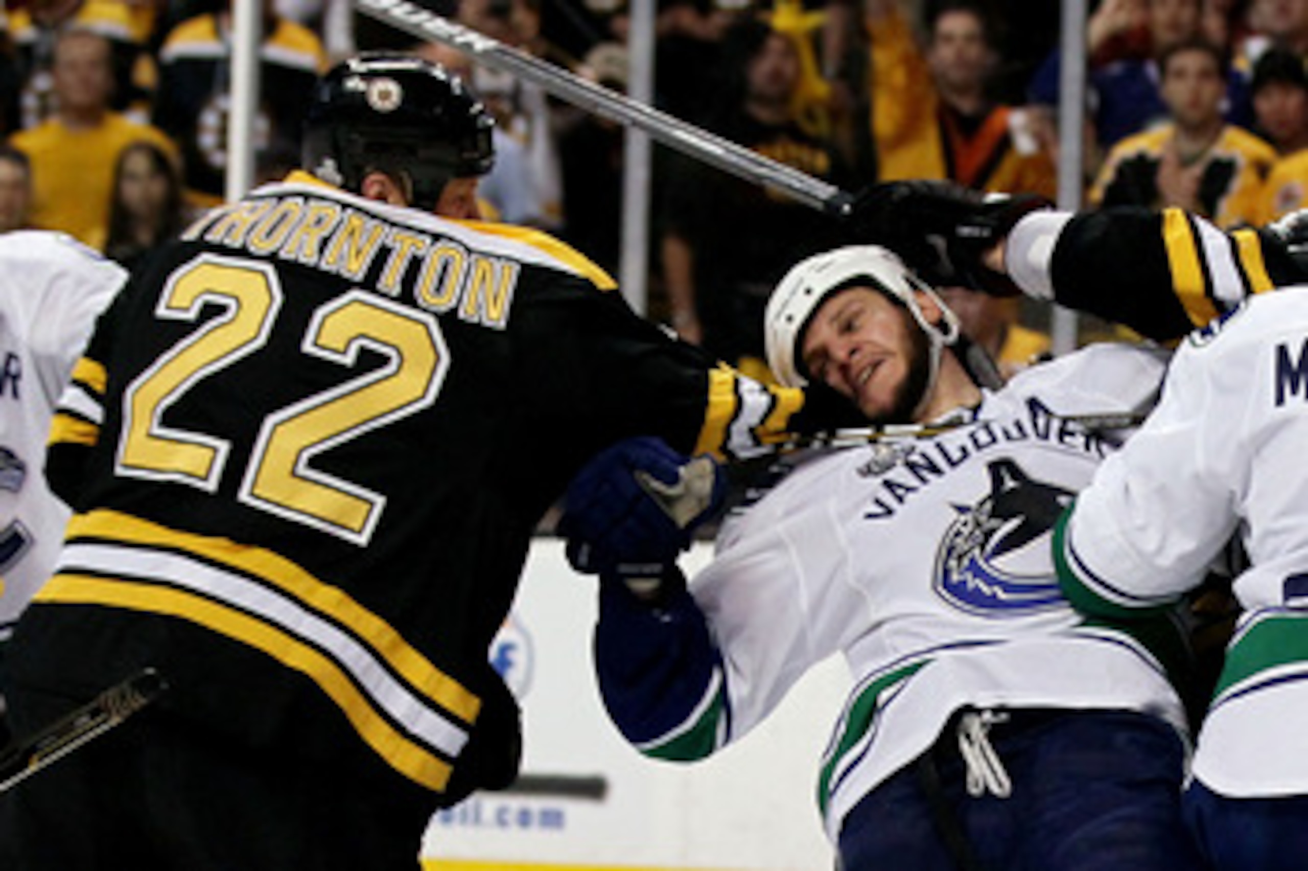 BOSTON, MA - JUNE 13:  Shawn Thornton #22 of the Boston Bruins fights with Kevin Bieksa #3 of the Vancouver Canucks during Game Six of the 2011 NHL Stanley Cup Final at TD Garden on June 13, 2011 in Boston, Massachusetts.  (Photo by Elsa/Getty Images)