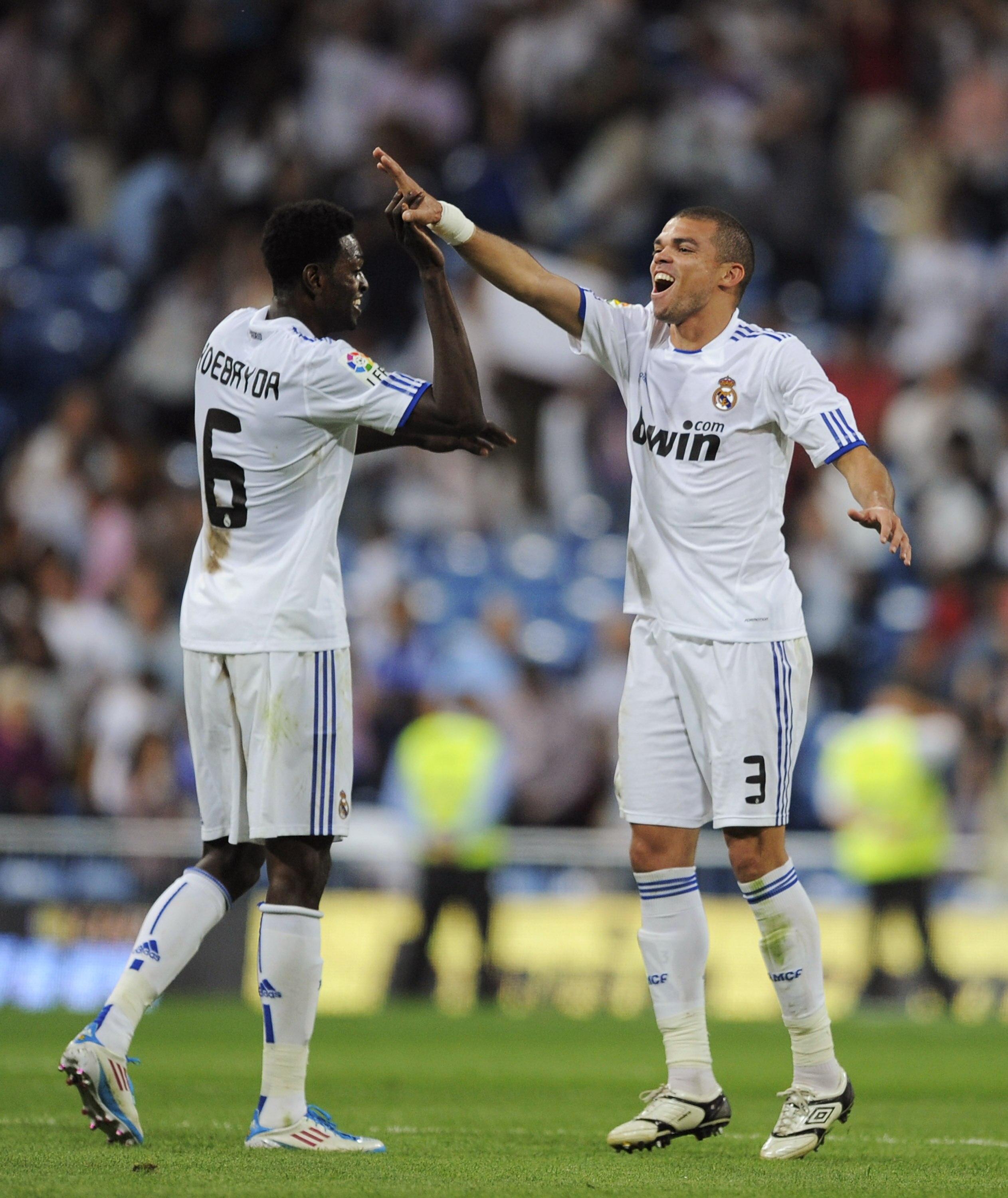 MADRID, SPAIN - MAY 21: Emmanuel Adebayor (L) of Real Madrid celebrates with Pepe after scoring during the La Liga match between Real Madrid and UD Almeria at Estadio Santiago Bernabeu on May 21, 2011 in Madrid, Spain.  (Photo by Denis Doyle/Getty Images)