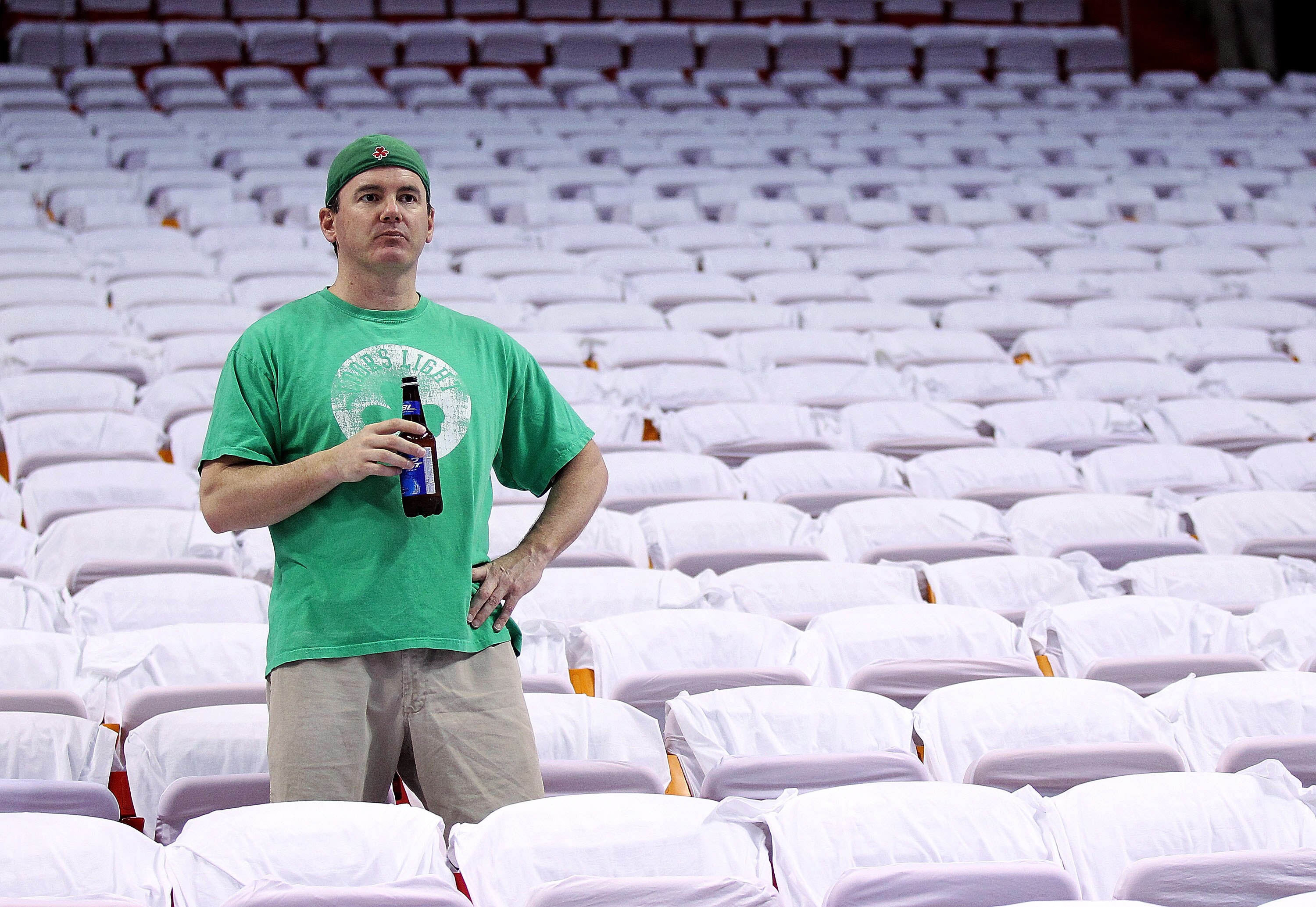 MIAMI, FL - MAY 03: A Boston Celtics fan wait for the start of Game Two of the Eastern Conference Semifinals of the 2011 NBA Playoffs against the Miami Heat at American Airlines Arena on May 3, 2011 in Miami, Florida. NOTE TO USER: User expressly acknowle MIAMI, FL - MAY 03: A Boston Celtics fan wait for the start of Game Two of the Eastern Conference Semifinals of the 2011 NBA Playoffs against the Miami Heat at American Airlines Arena on May 3, 2011 in Miami, Florida. NOTE TO USER: User expressly acknowle