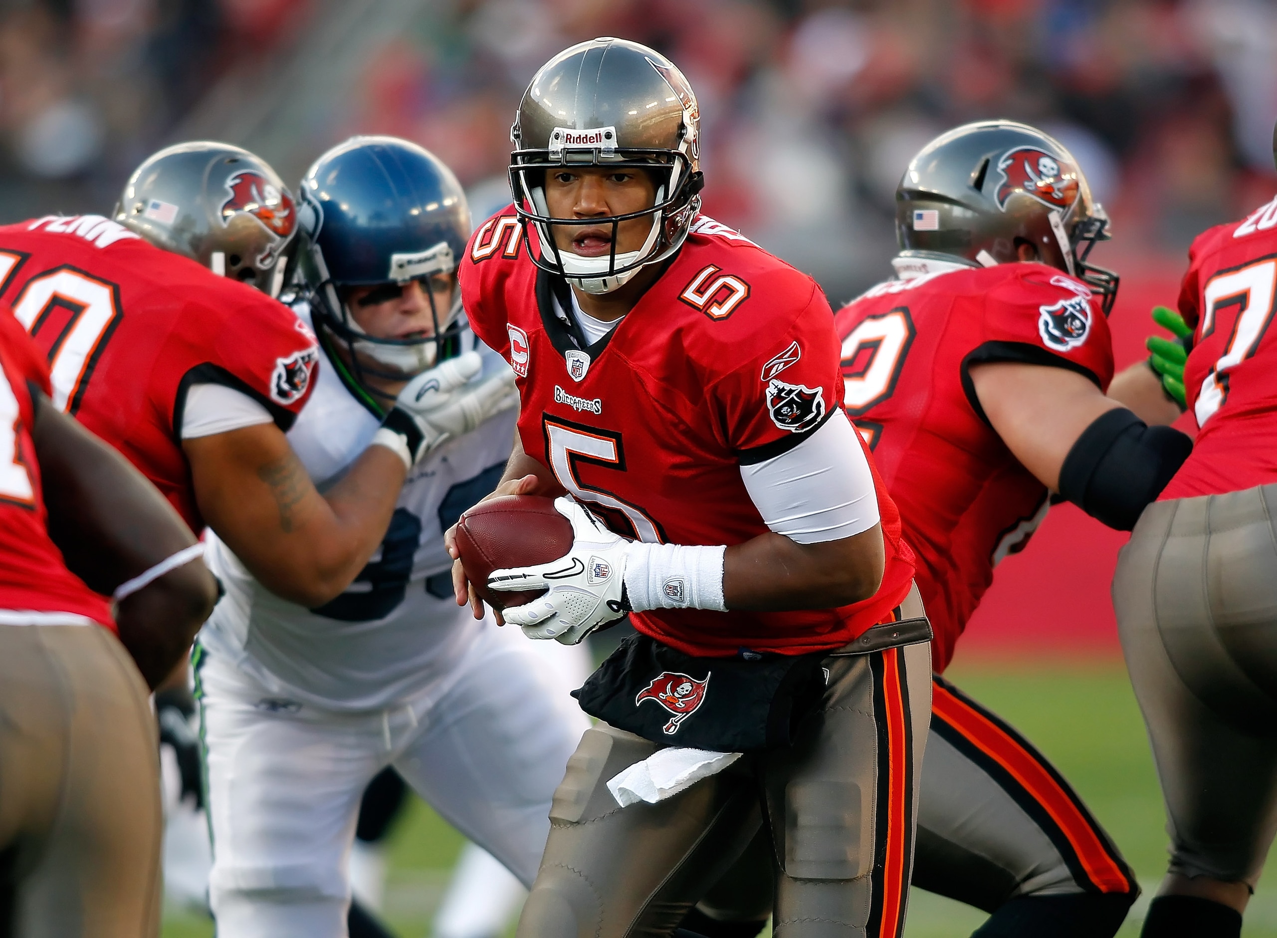 TAMPA, FL - DECEMBER 26: Quarterback Josh Freeman #5 of the Tampa Bay Buccaneers hands the ball off against the Seattle Seahawks during the game at Raymond James Stadium on December 26, 2010 in Tampa, Florida. (Photo by J. Meric/Getty Images)