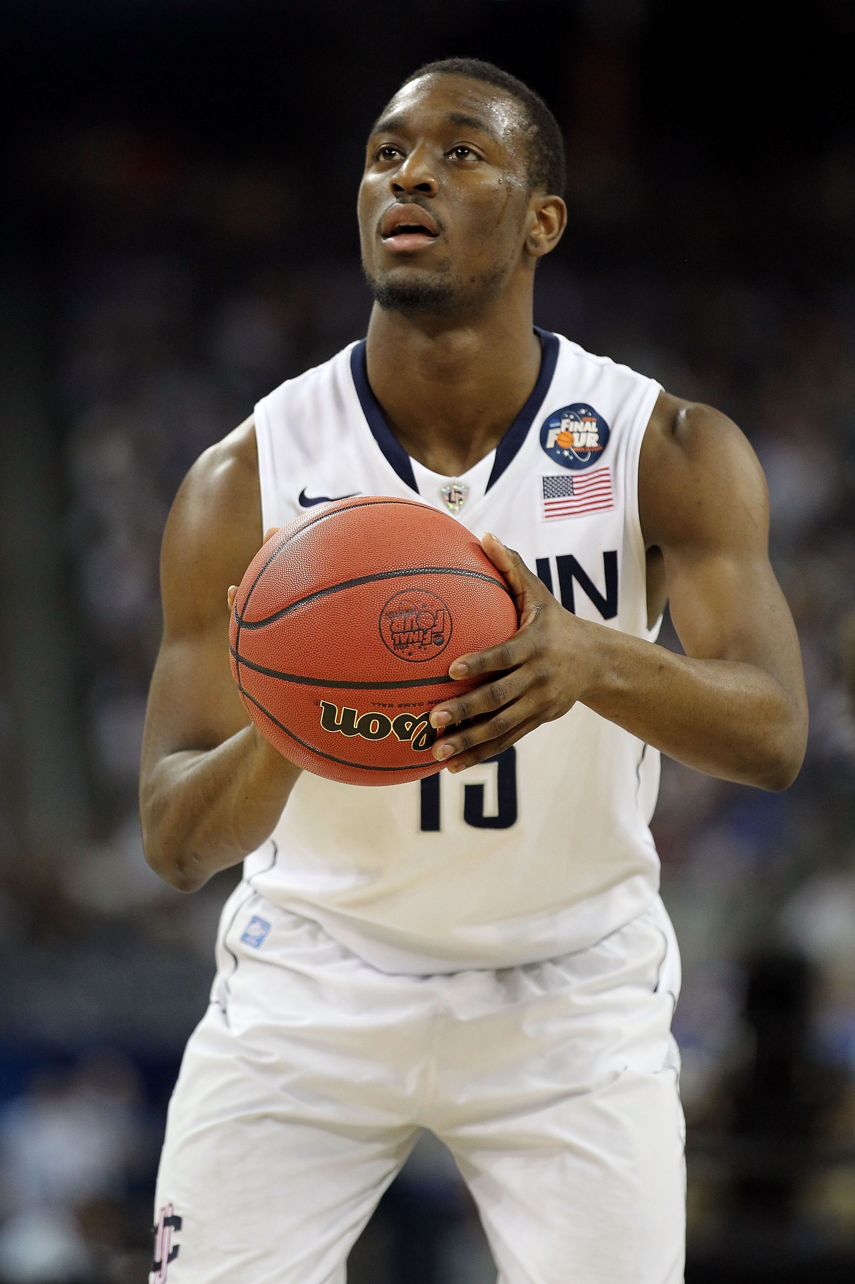HOUSTON, TX - APRIL 02:  Kemba Walker #15 of the Connecticut Huskies shoots a free throw while taking on the Kentucky Wildcats during the National Semifinal game of the 2011 NCAA Division I Men's Basketball Championship at Reliant Stadium on April 2, 2011